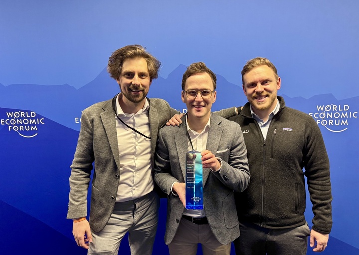 OAO team receiving the WEF award at Davos