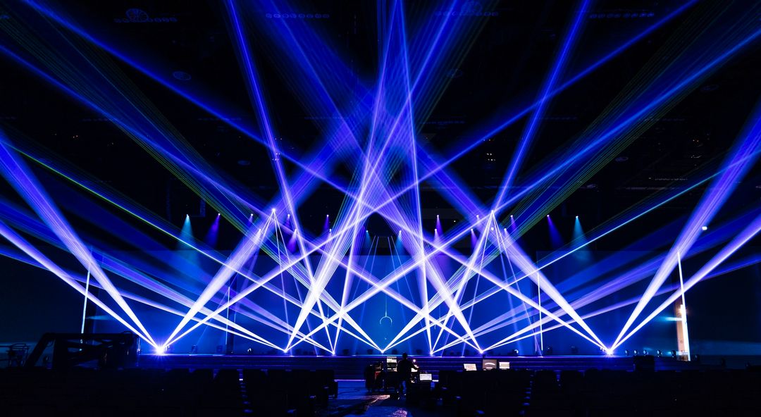Laser beam show over a concert stage