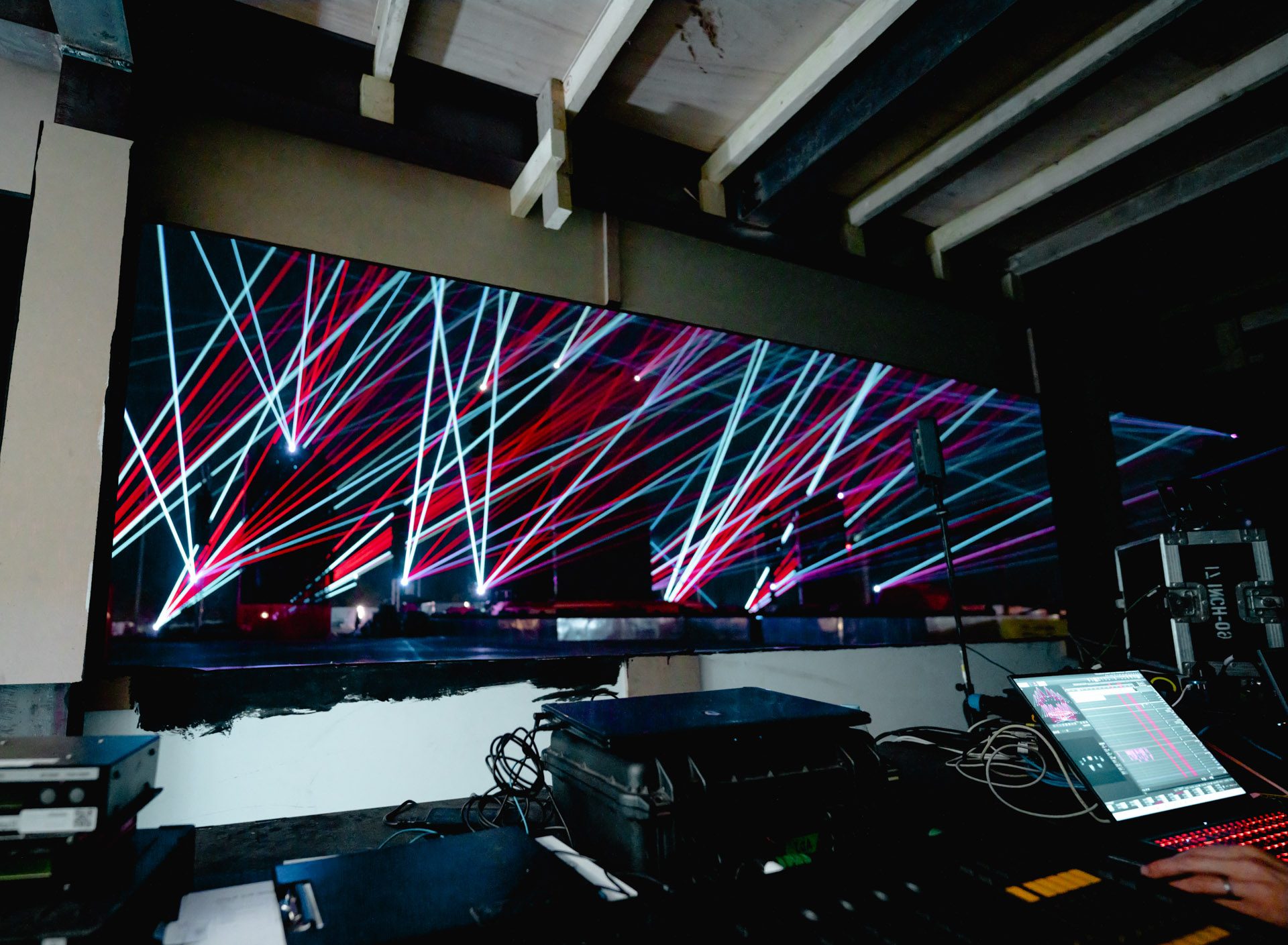 Laser show operators at the front-of-house control position during Al Qadsiah Festival 2025