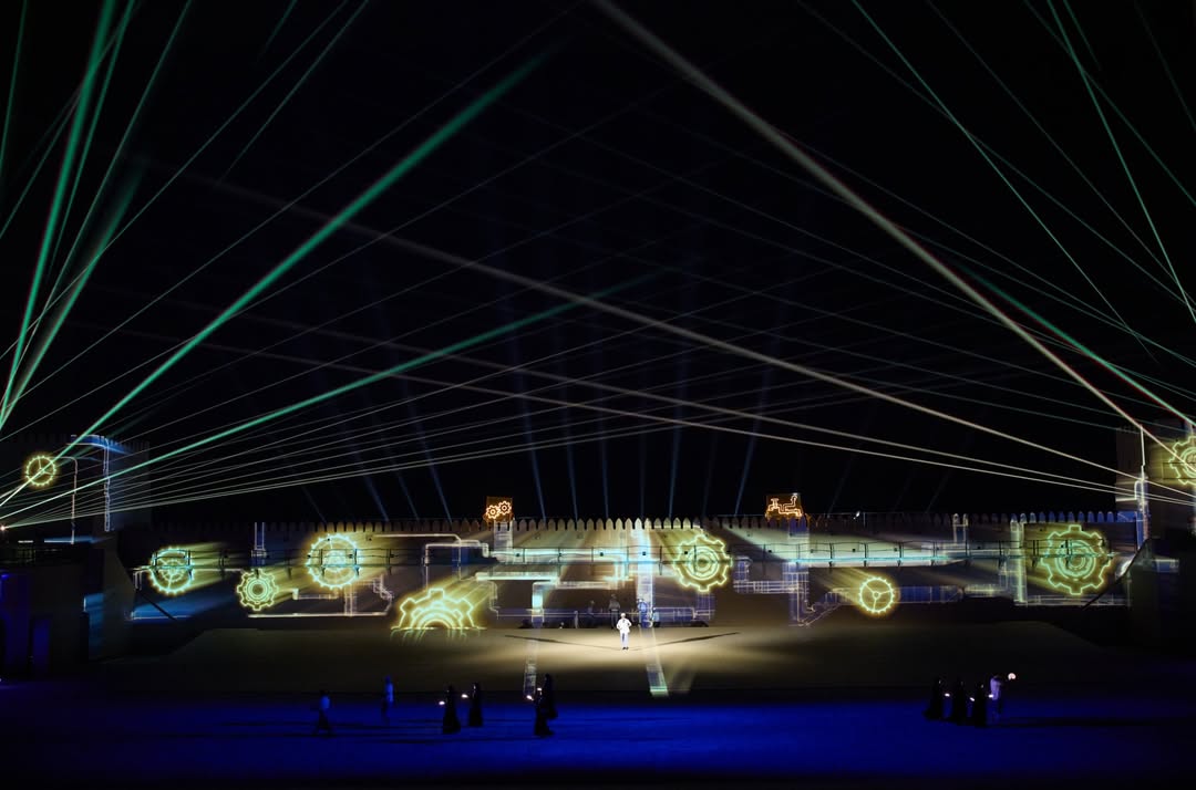 Green laser fans over the mapped fort walls, Eid Al Etihad The UAE National Day Al Dhafra Fort, Abu Dhabi, UAE