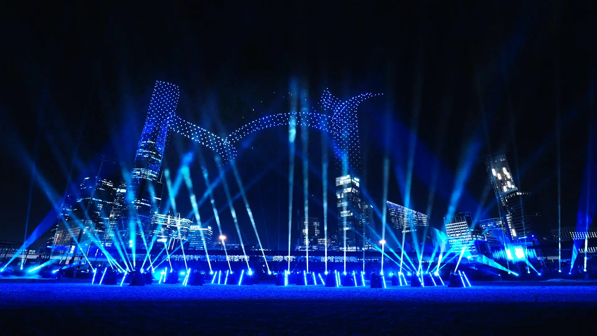 Blue laser beams and drone graphics above the arena, Longines Global Champions Tour Finals Riyadh