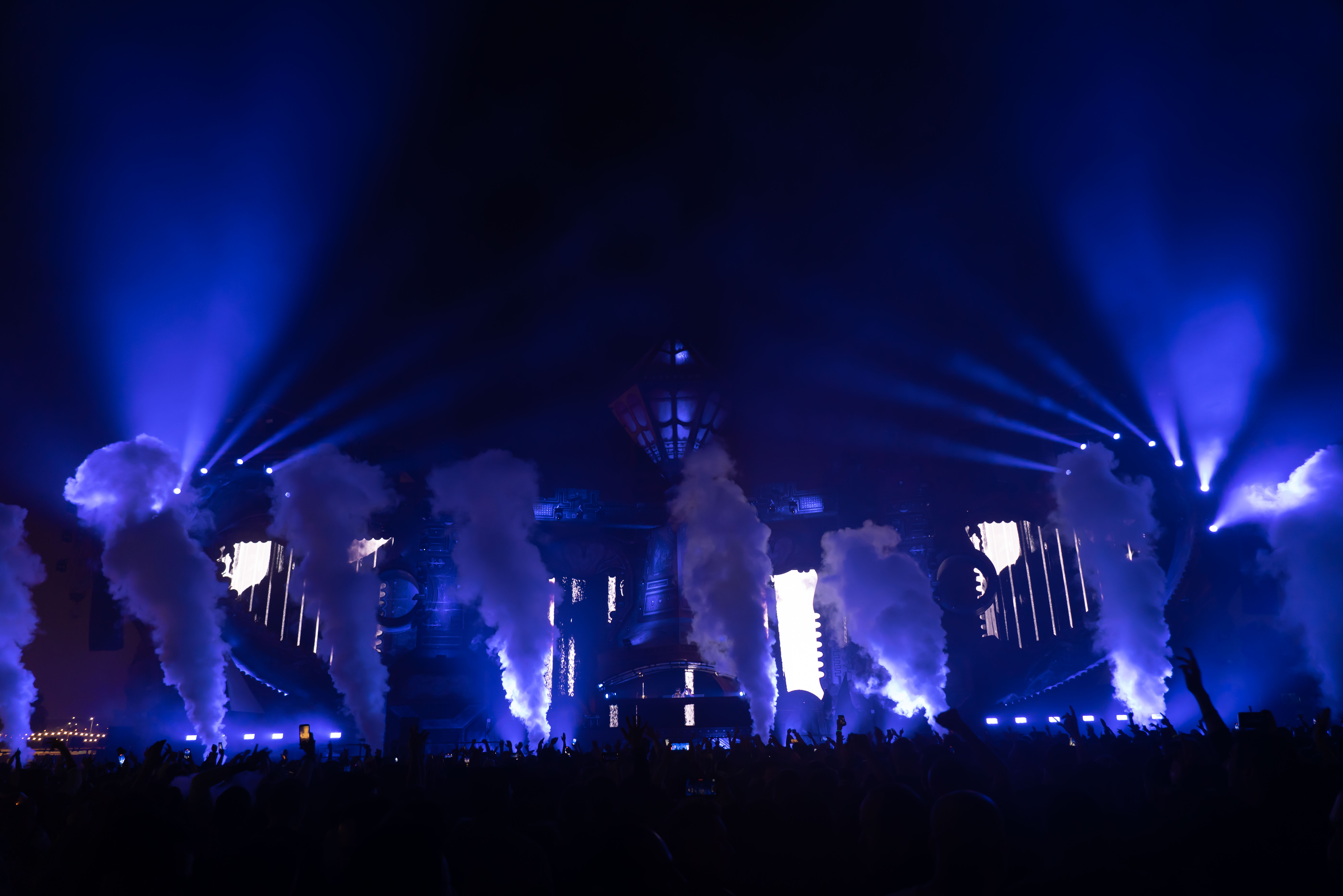 Blue-lit stage towers with CO2 and beams, Daydream Festival Stage Qatar FIFA, Doha, Qatar