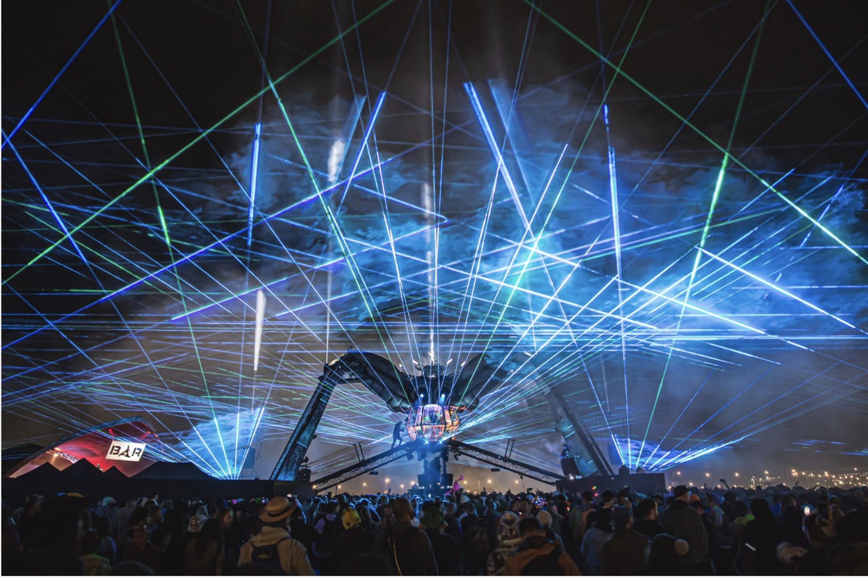 Laser web over the spider stage and crowd, Arcadia Spider and Stage at FIFA Qatar