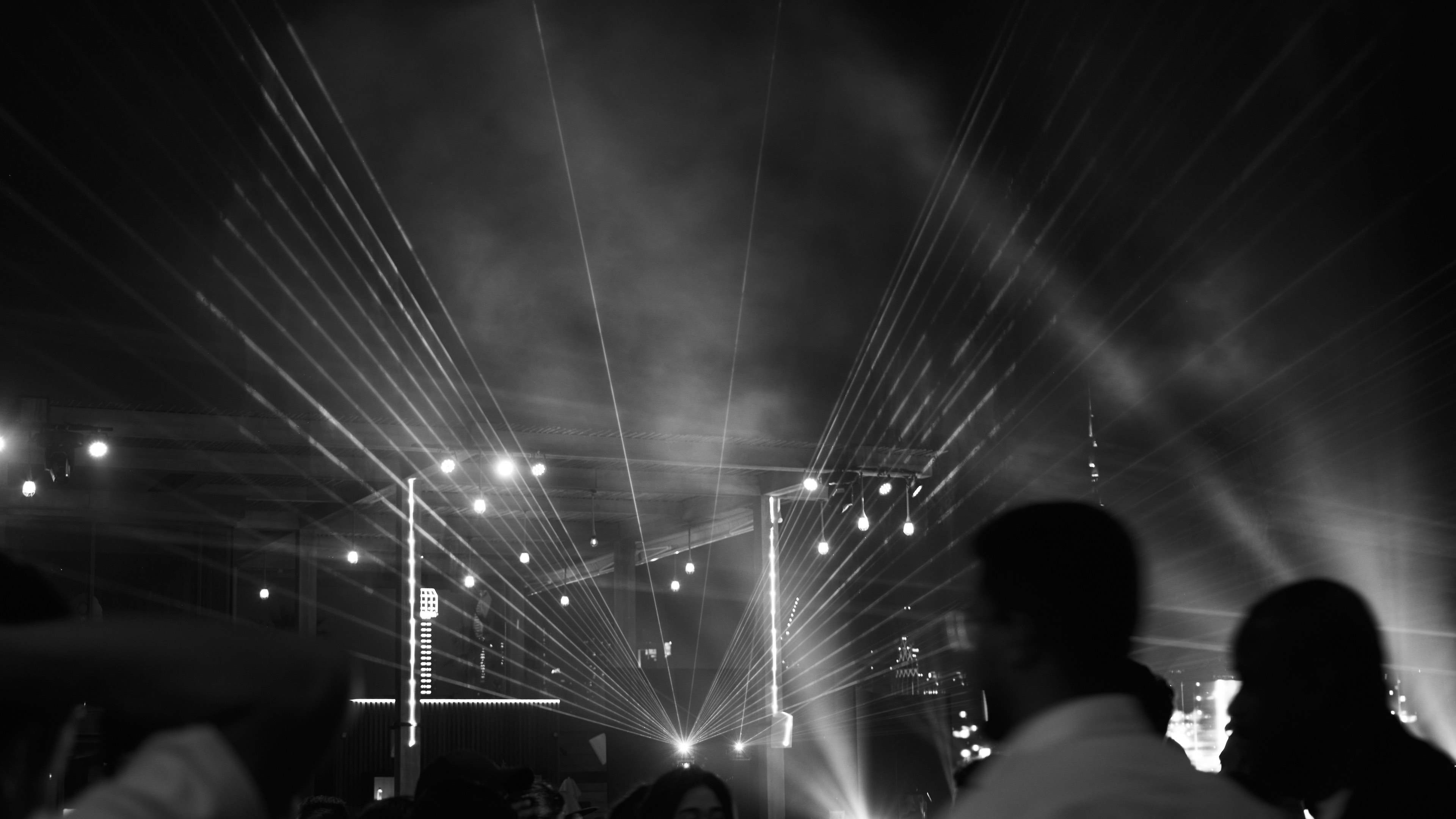 Laser beams through haze over the guests, Skechers Corporate Meetup, Dubai, UAE