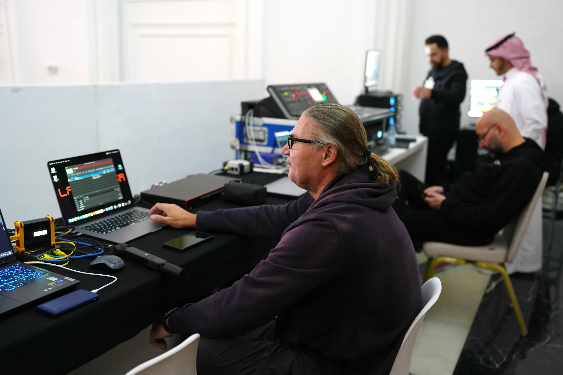 Show operators at the control desk backstage, MAADEN Multimedia Show, Riyadh, KSA