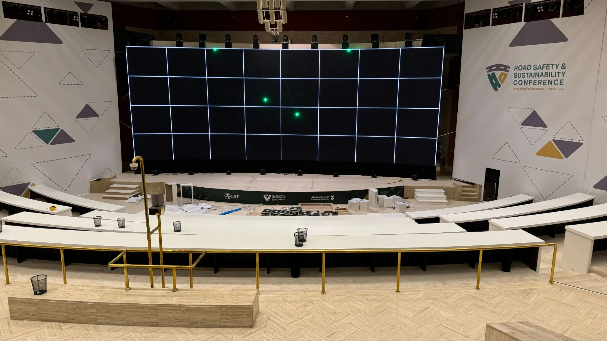 Grid alignment on the LED screen during setup, with laser points on the cells, Riyadh Roads Safety Conference, KSA