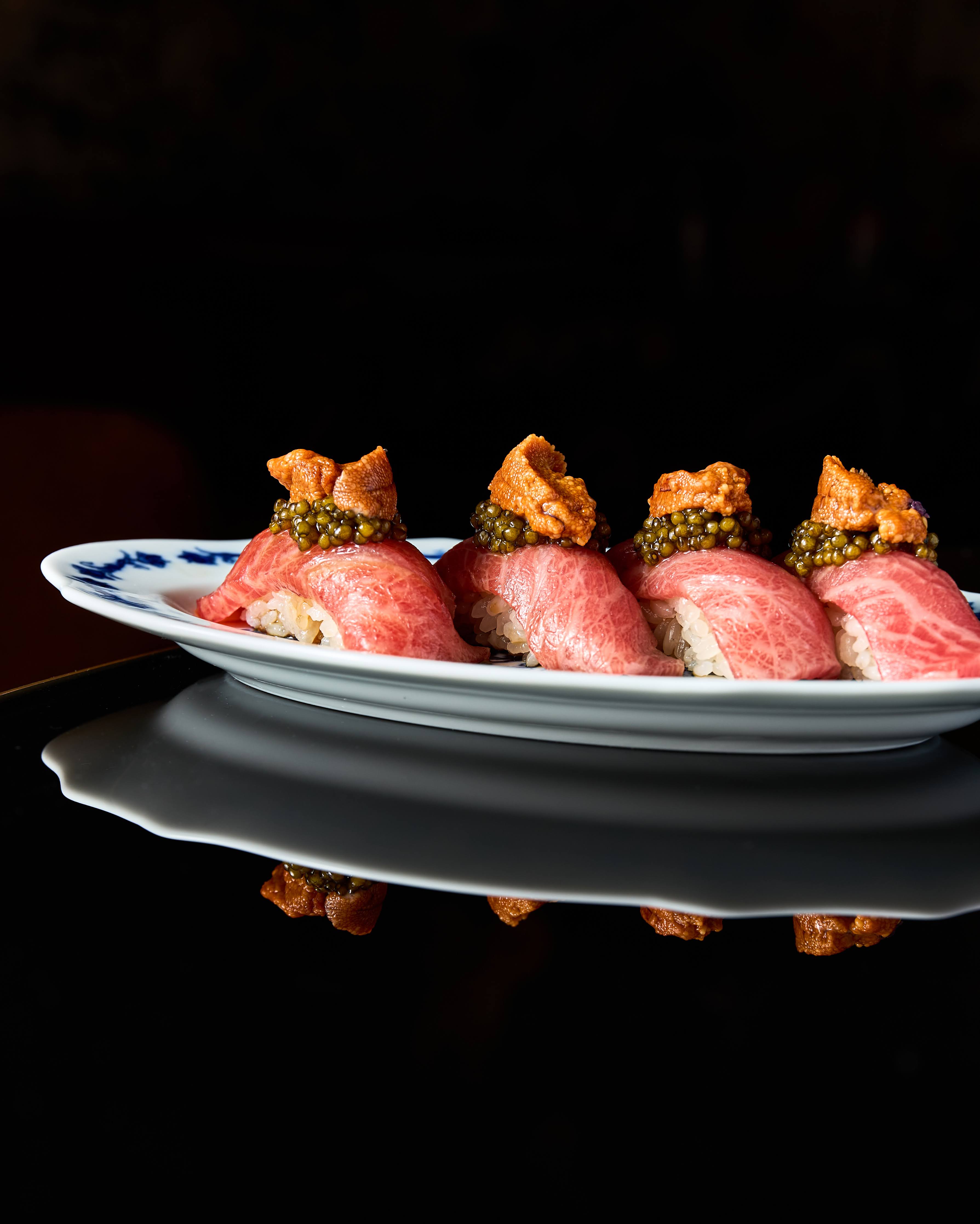 Chef preparing sushi and nigiri
