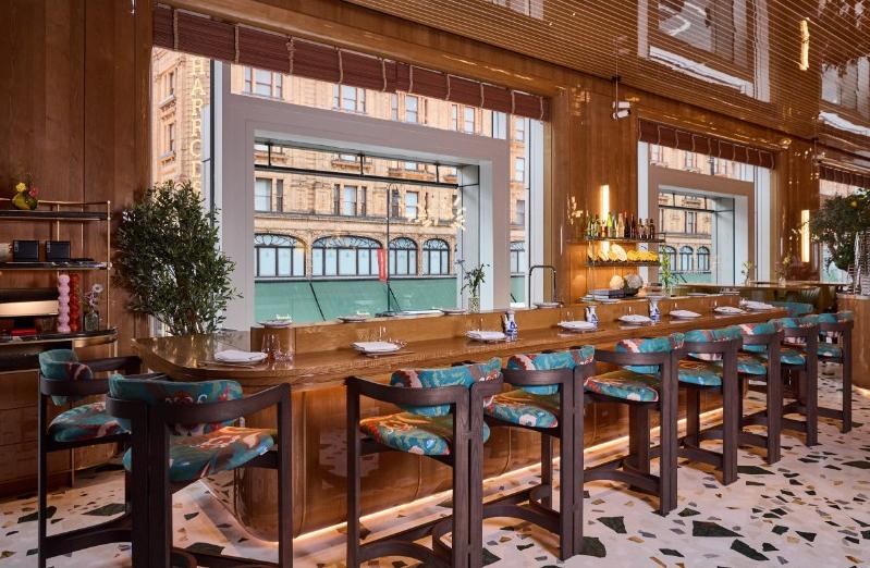 ALBA omakase bar interior with chefs at the sushi counter