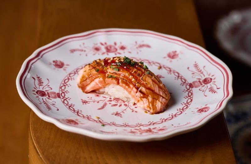 ALBA omakase bar interior with chefs at the sushi counter