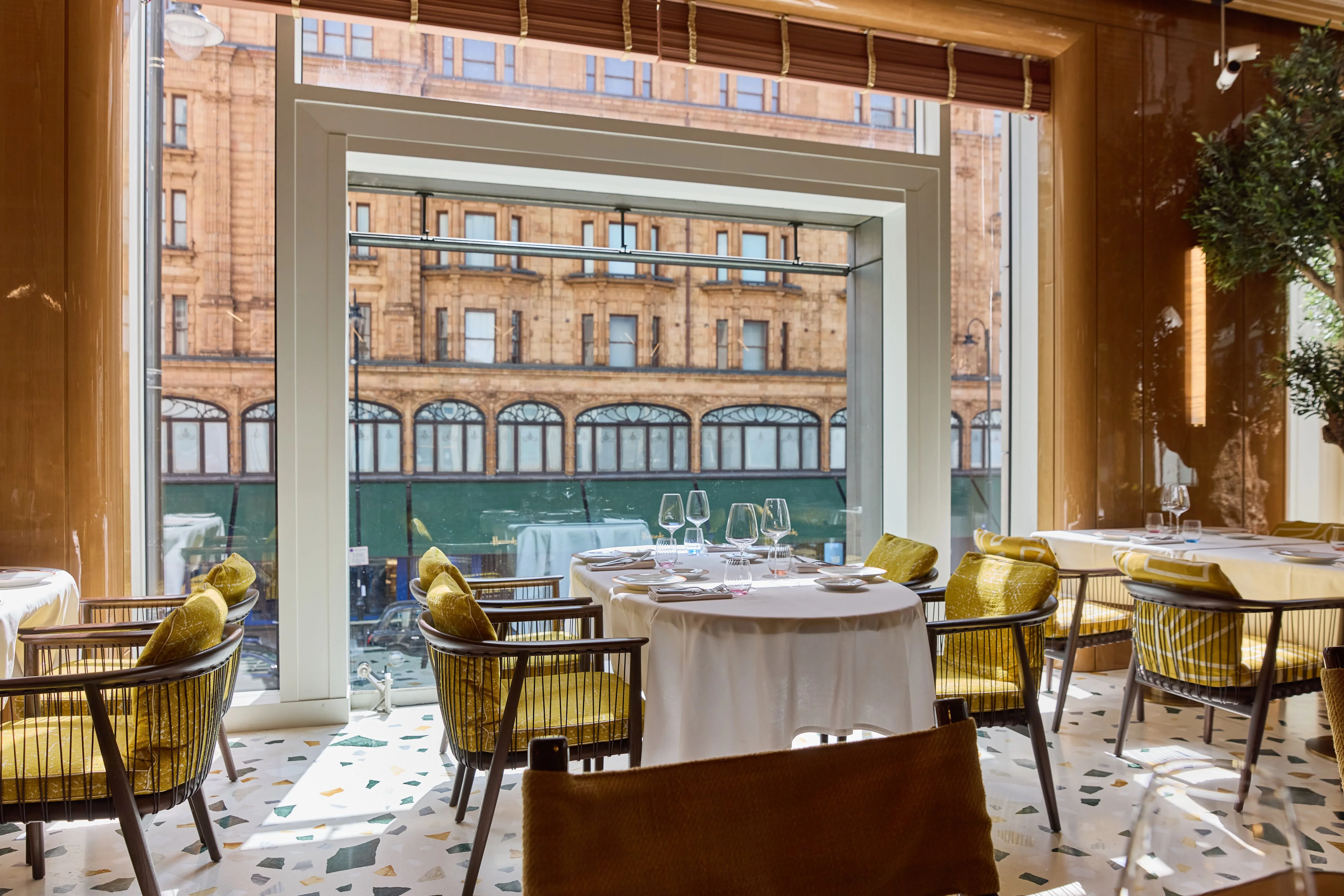 A sunlit table at ALBA London, opposite Harrods in Knightsbridge