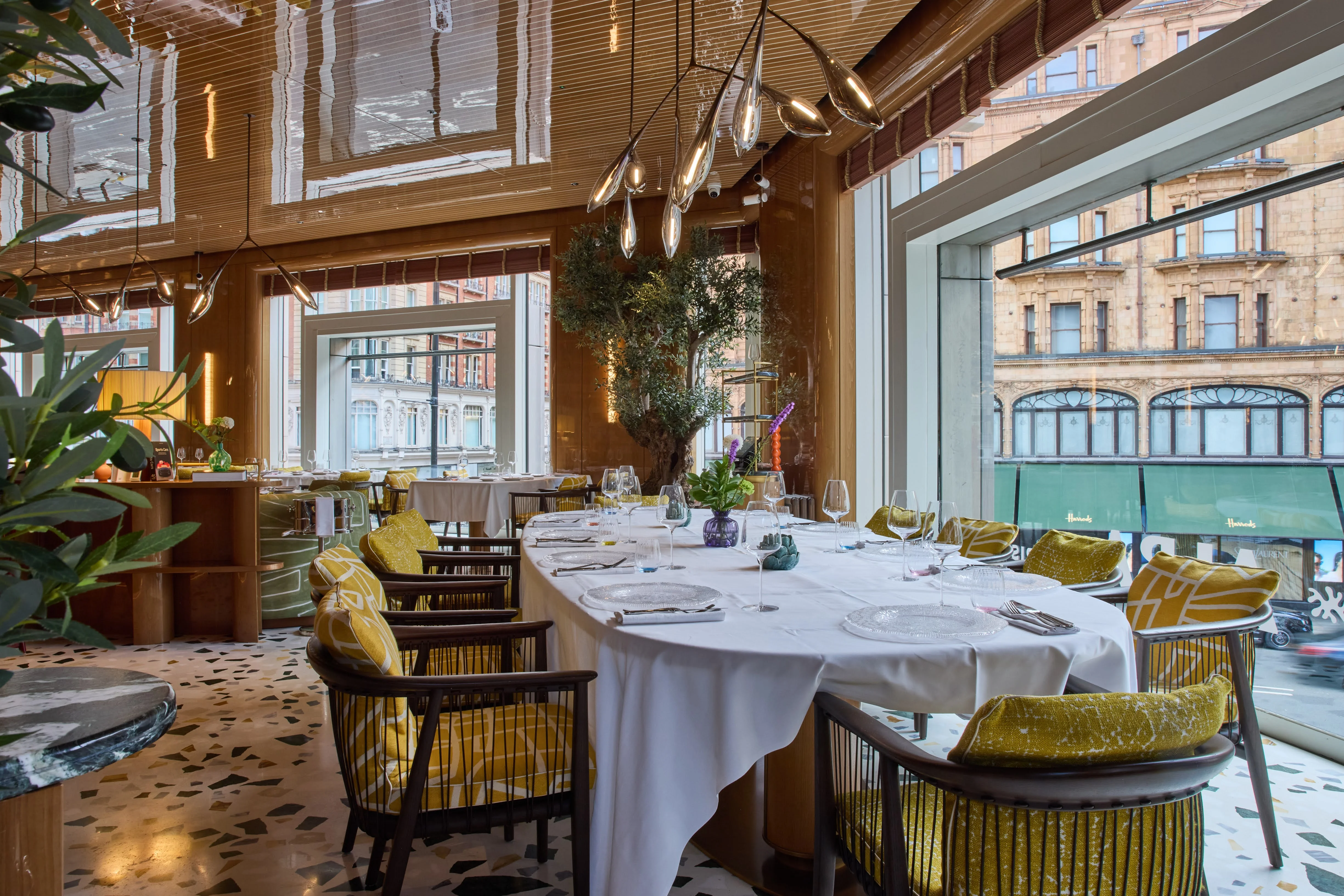 Group dining table facing Harrods at ALBA London