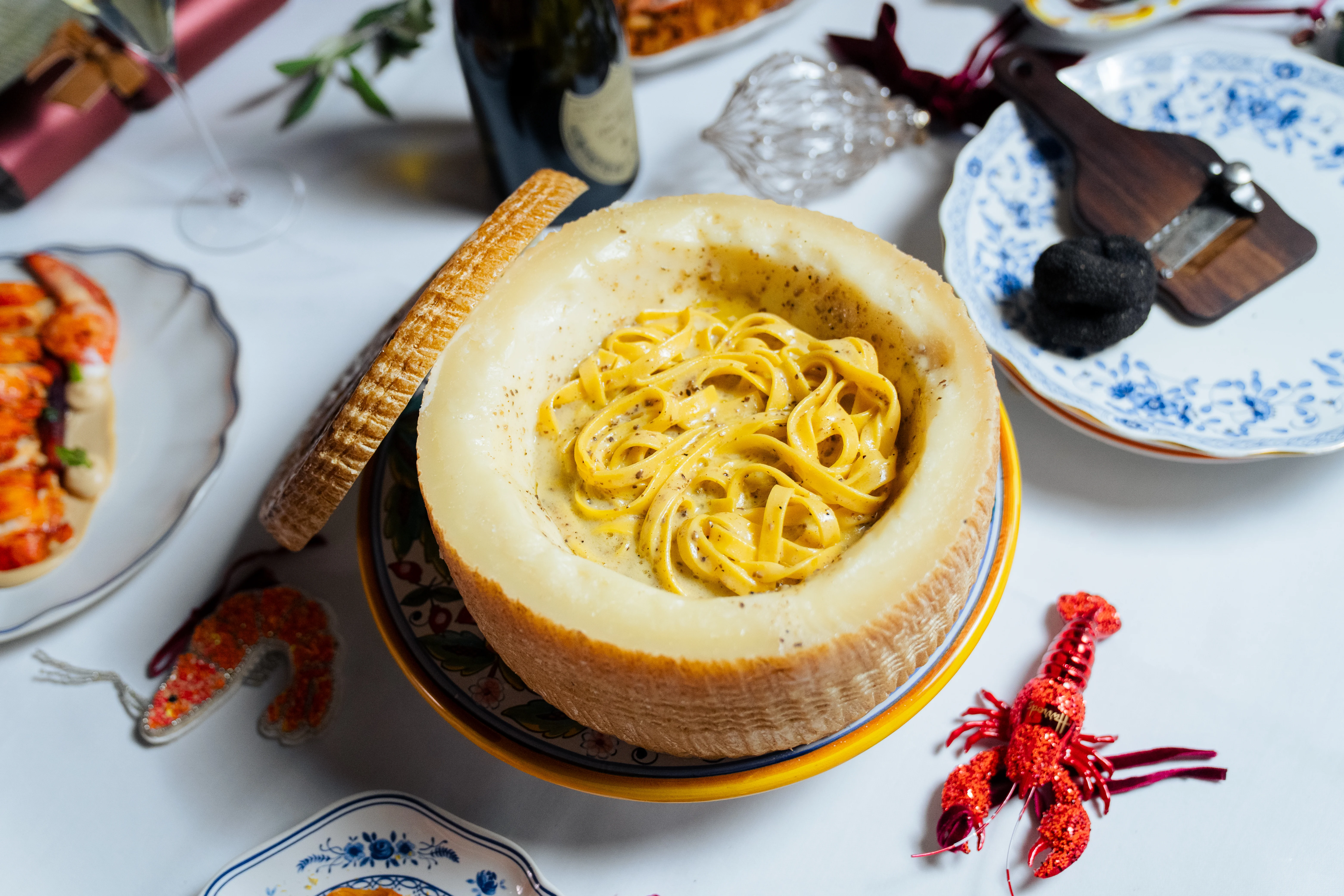 Tagliatelle tossed inside a whole Pecorino cheese wheel at ALBA London, Knightsbridge