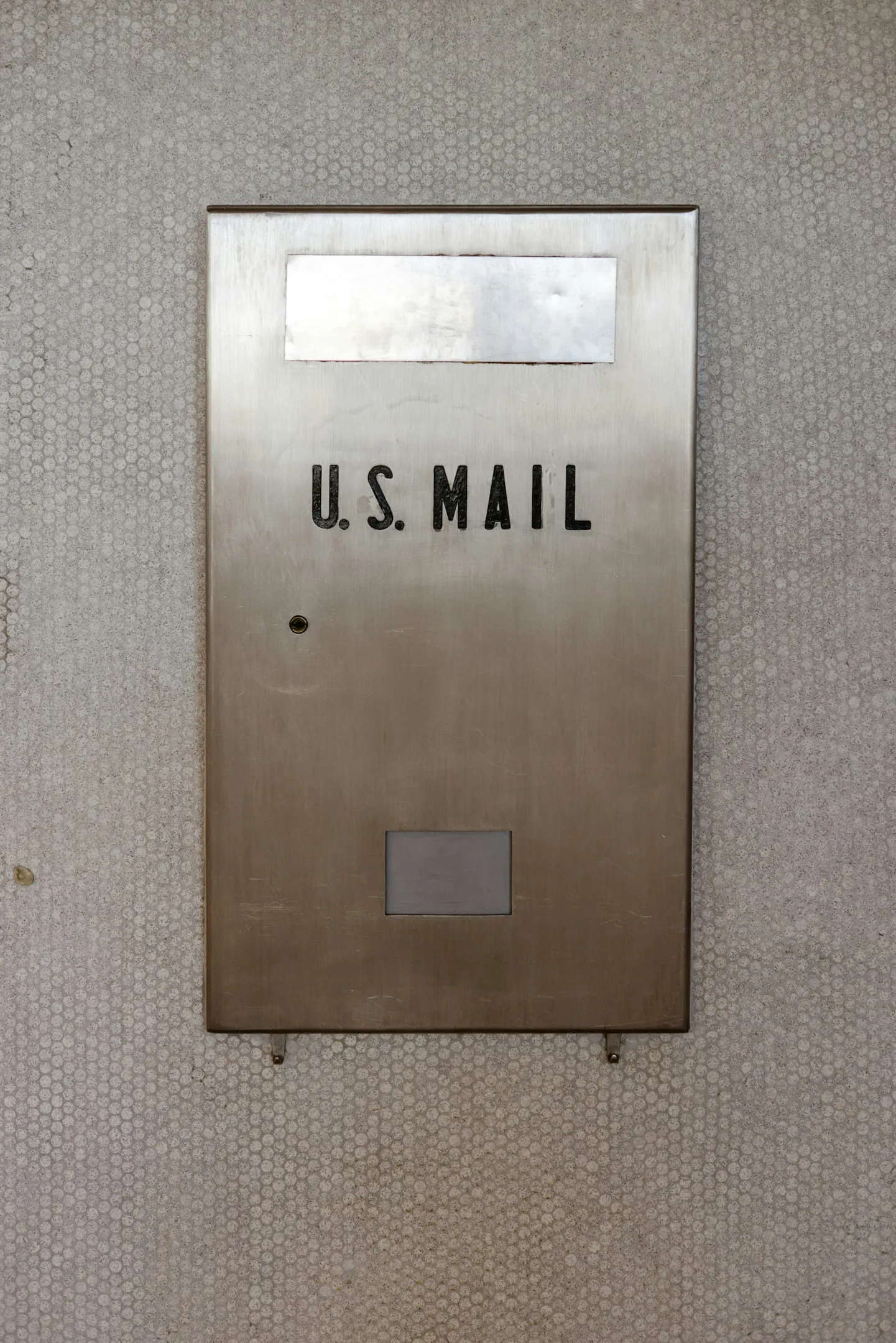 Professional workspace with a mail handling area representing virtual business address services and mail management for remote entrepreneurs.