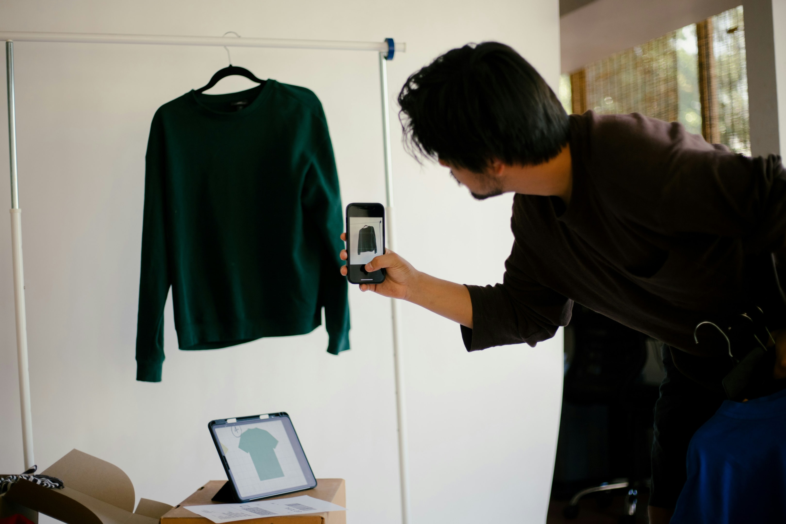 Professional workspace with shipping boxes and packing materials, illustrating a home-based ecommerce business managing order fulfillment and logistics efficiently.