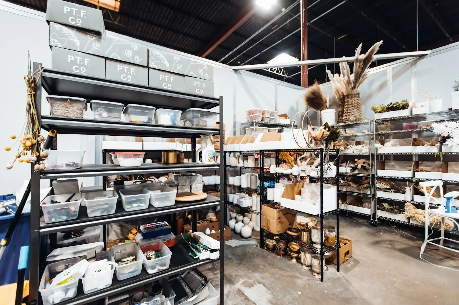 This co-warehousing space utilizes different organizers to allow entrepreneurs to create an efficient space for their products.