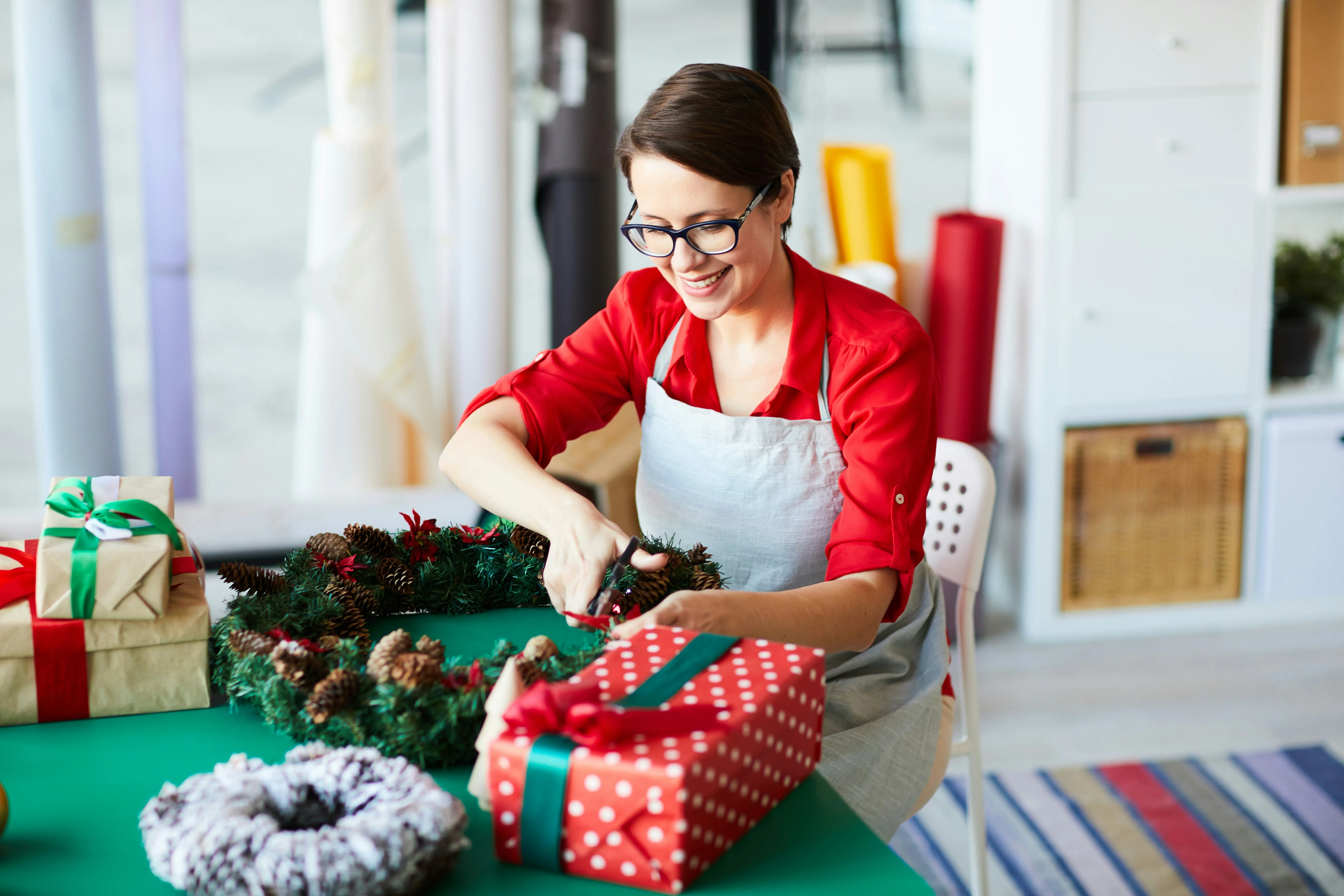 A small business owner preparing for the holiday shipping season