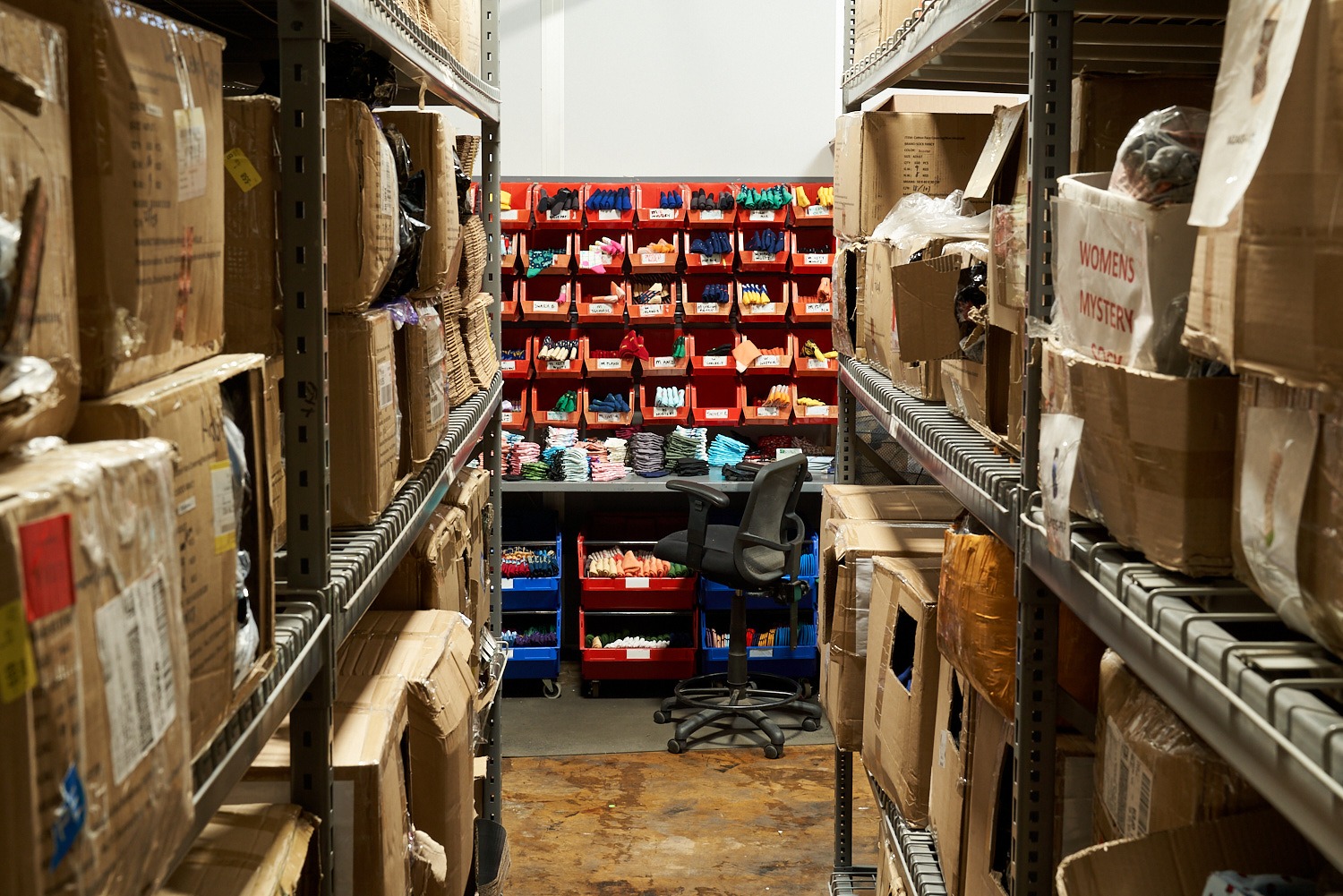 A warehouse location displaying vertical shelving to maximize space and reduce warehouse costs.