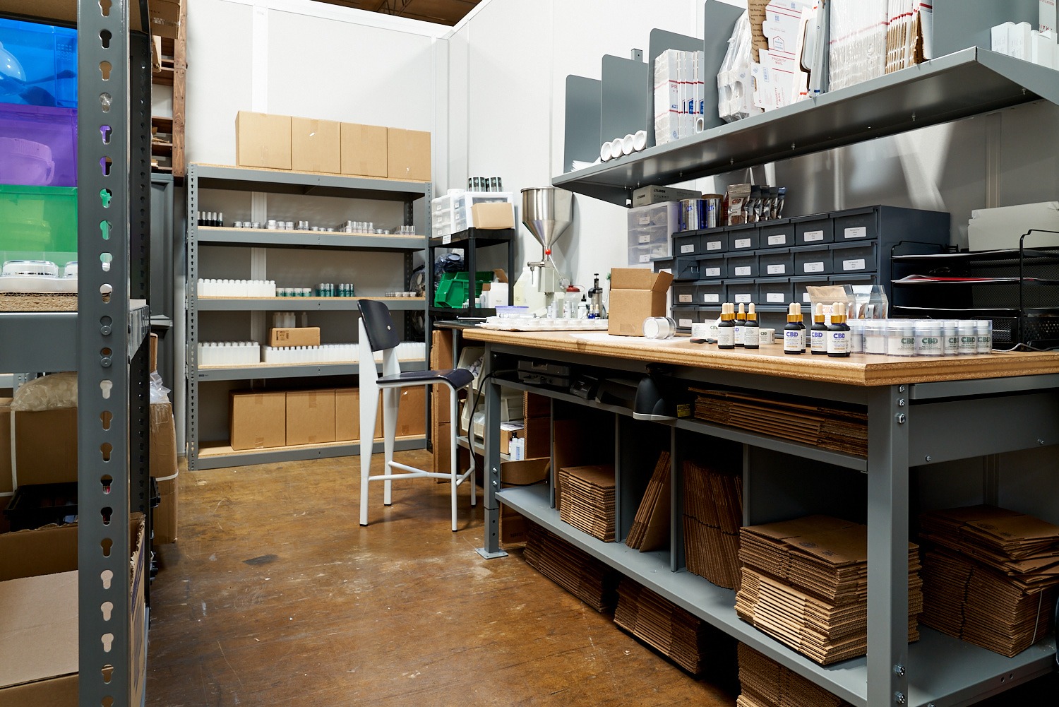 An operator figured out how to increase storage capacity in a warehouse by utilizing vertical shelving units.