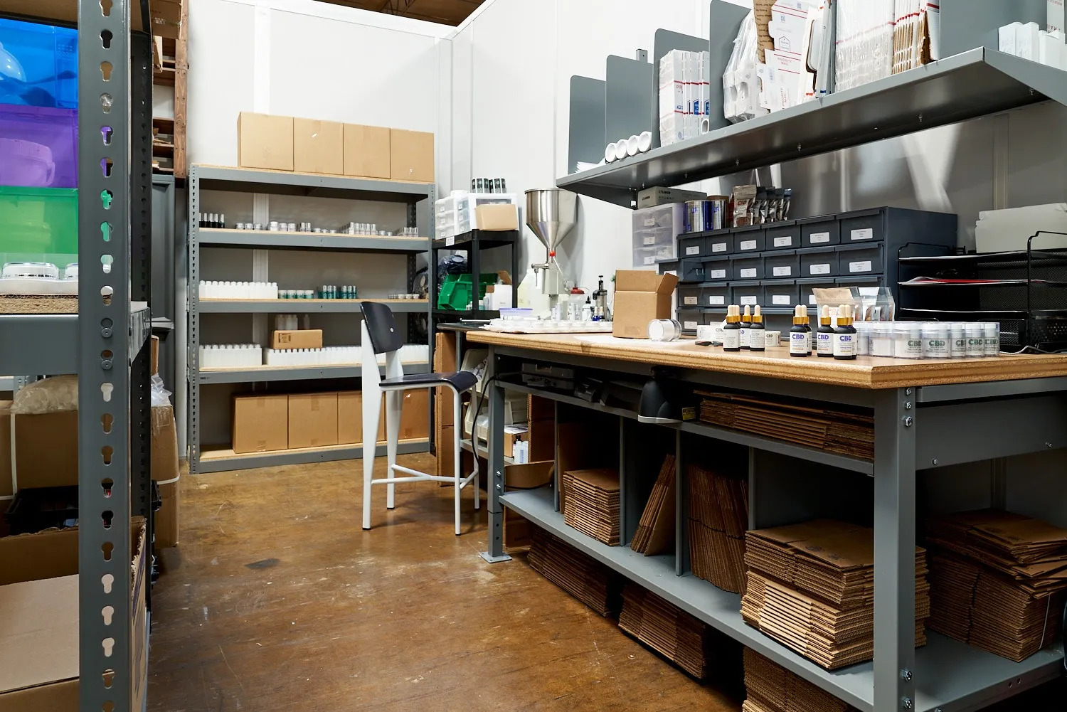 An operator figured out how to increase storage capacity in a warehouse by utilizing vertical shelving units.
