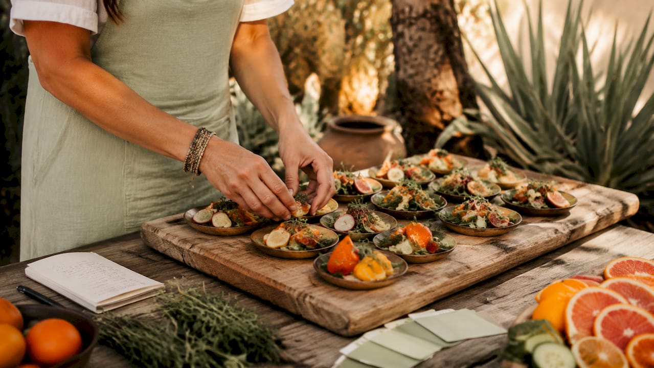 Caterer arranging meals by schedule timing