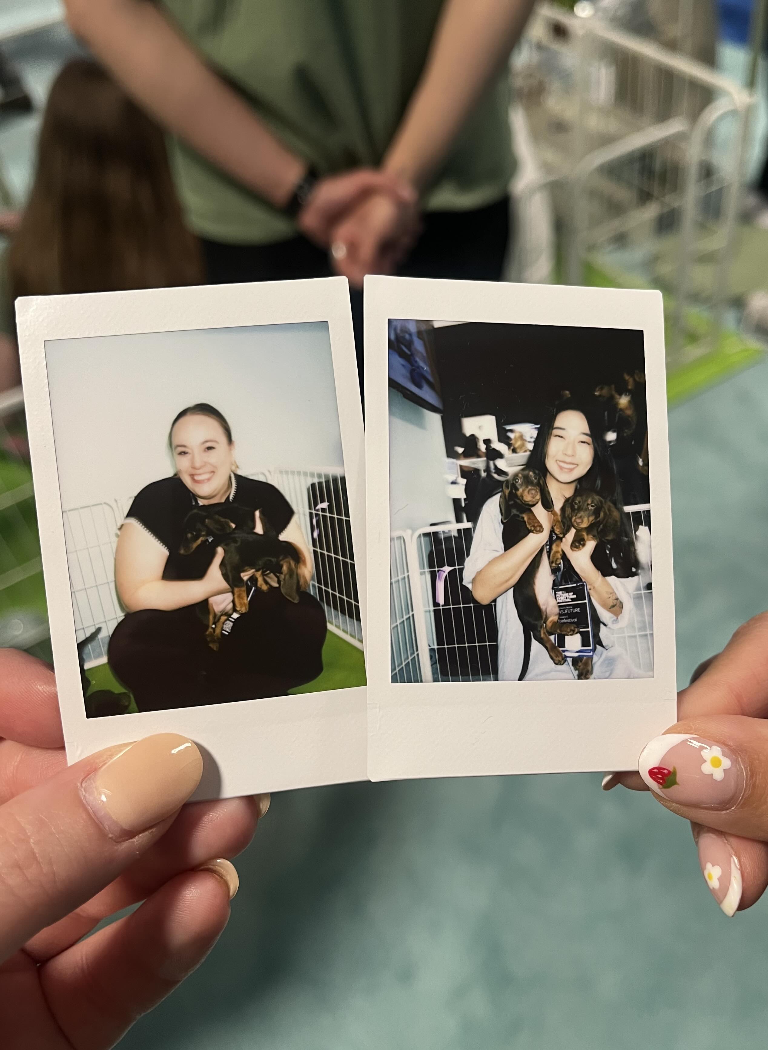 Two girls engaging with the PuppySphere at Wall Street Journal's Future of Everything Festival