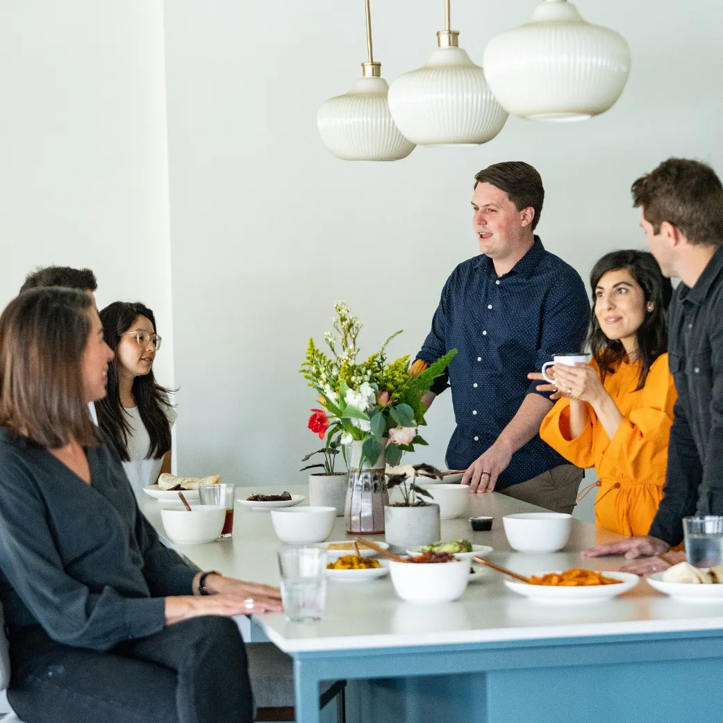 Local's team enjoys breakfast together in the office kitchen