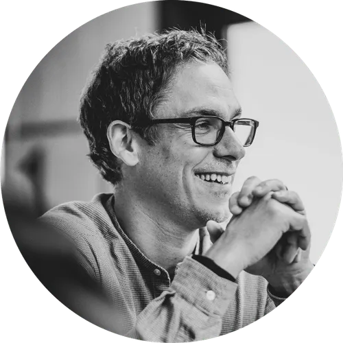 Neil Bedwell smiling while giving a talk
