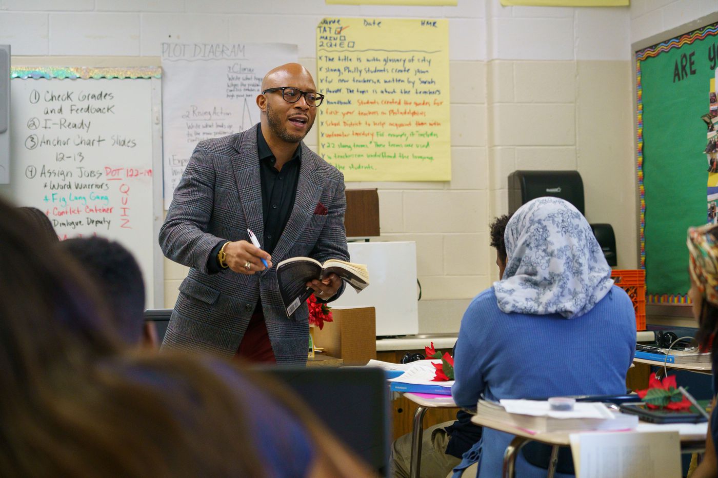 Teacher in front of his Classroom