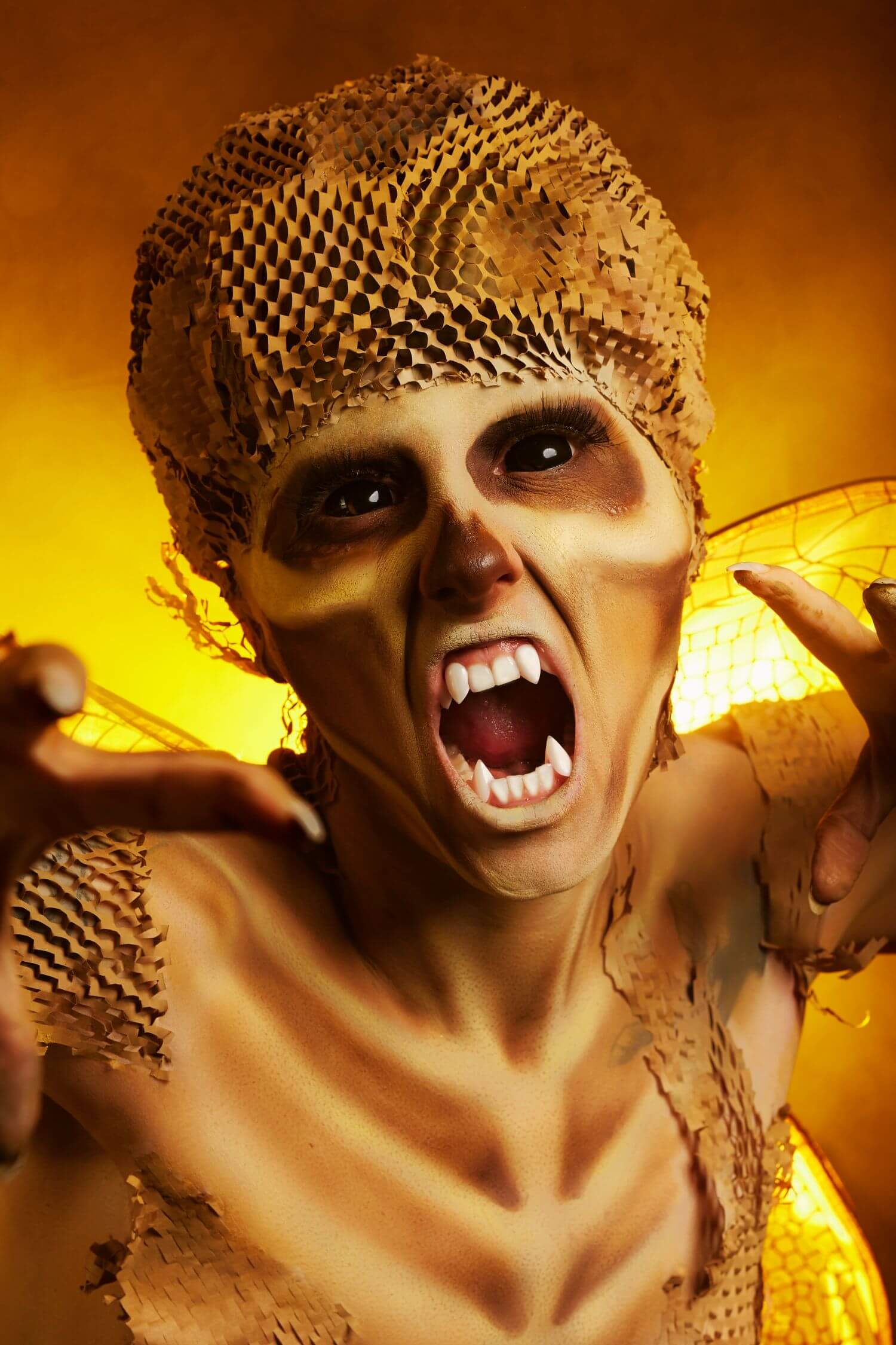 Gaunt, humanoid wasp creature body paint makeup done by OKOS Creations