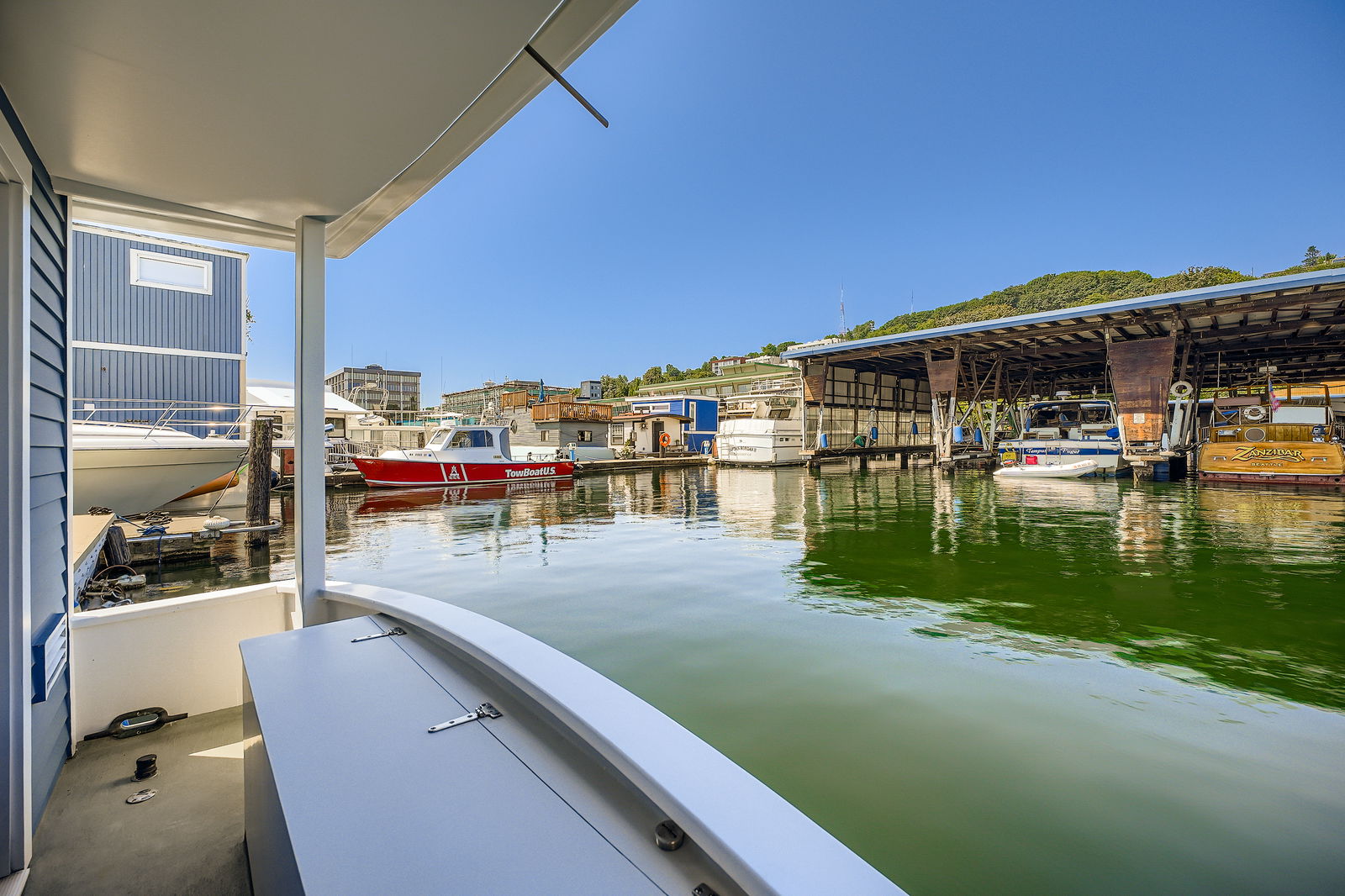 Covered main level deck with storage