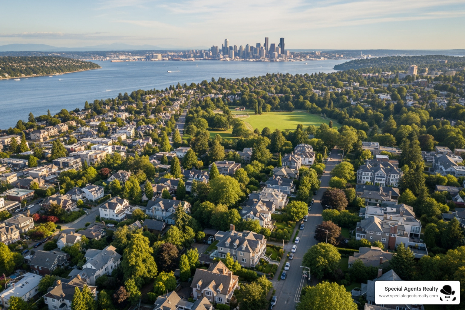 Infographic showing Magnolia WA key features: surrounded by water on three sides, home to 534-acre Discovery Park, The Village commercial district with cafes and boutiques, diverse architectural styles including Cape Cod and Craftsman homes, secluded yet connected to downtown Seattle - best real estate agent in magnolia wa