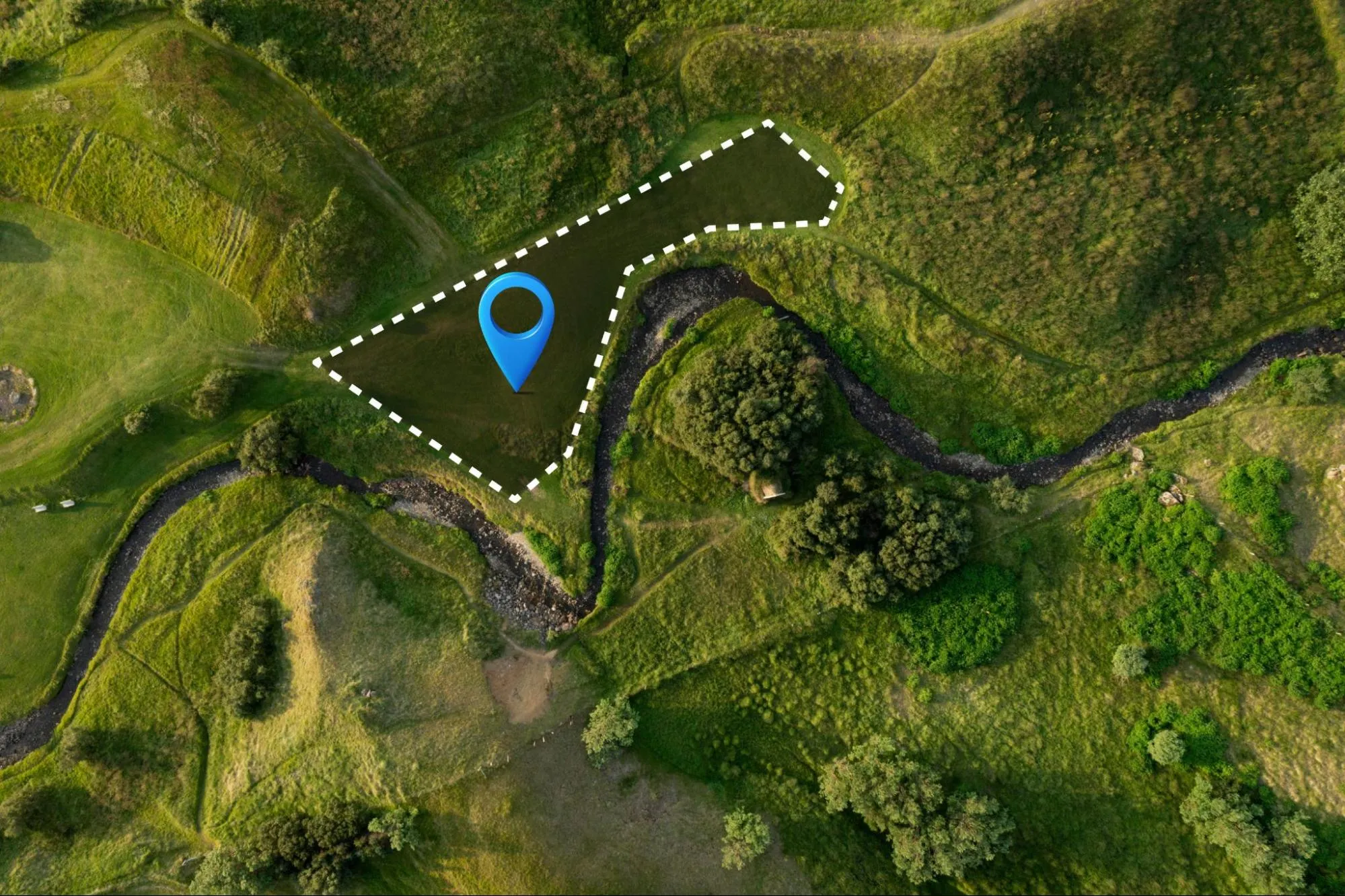 View of a land plot with greenery all around.