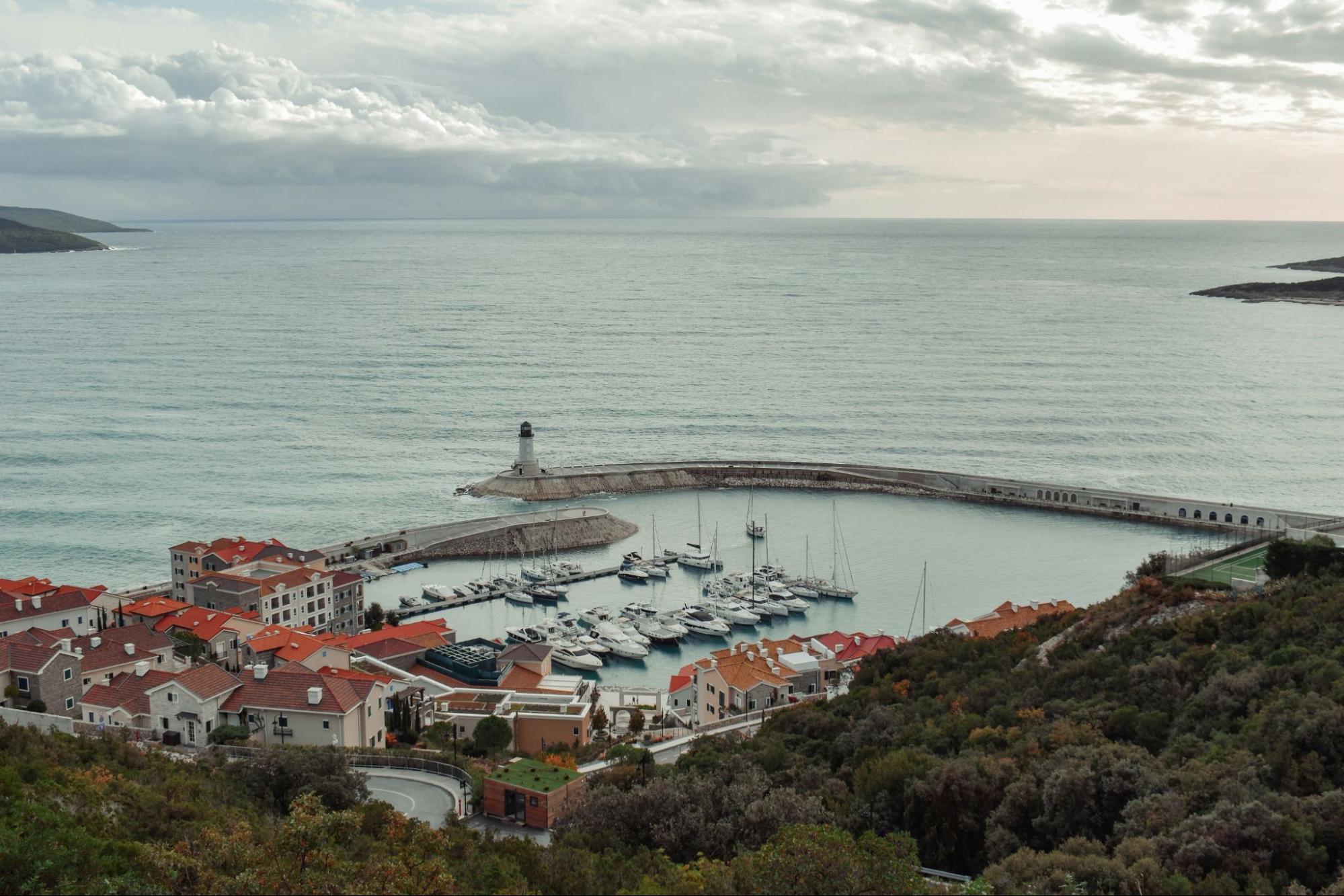 Aries view of the Luštica Bay in Montenegro with real estate properties on the coast.