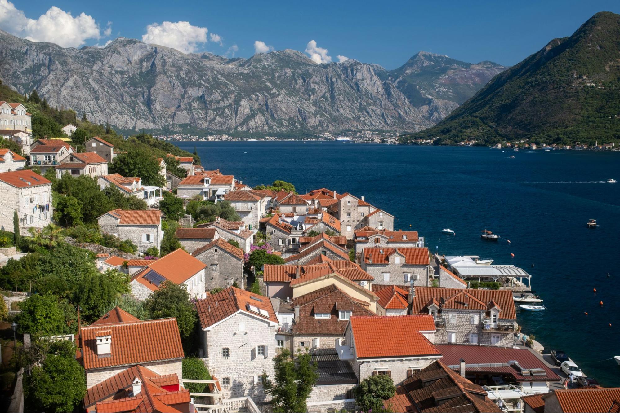 Brick-roof houses near the coast in Perast, Montenegro.