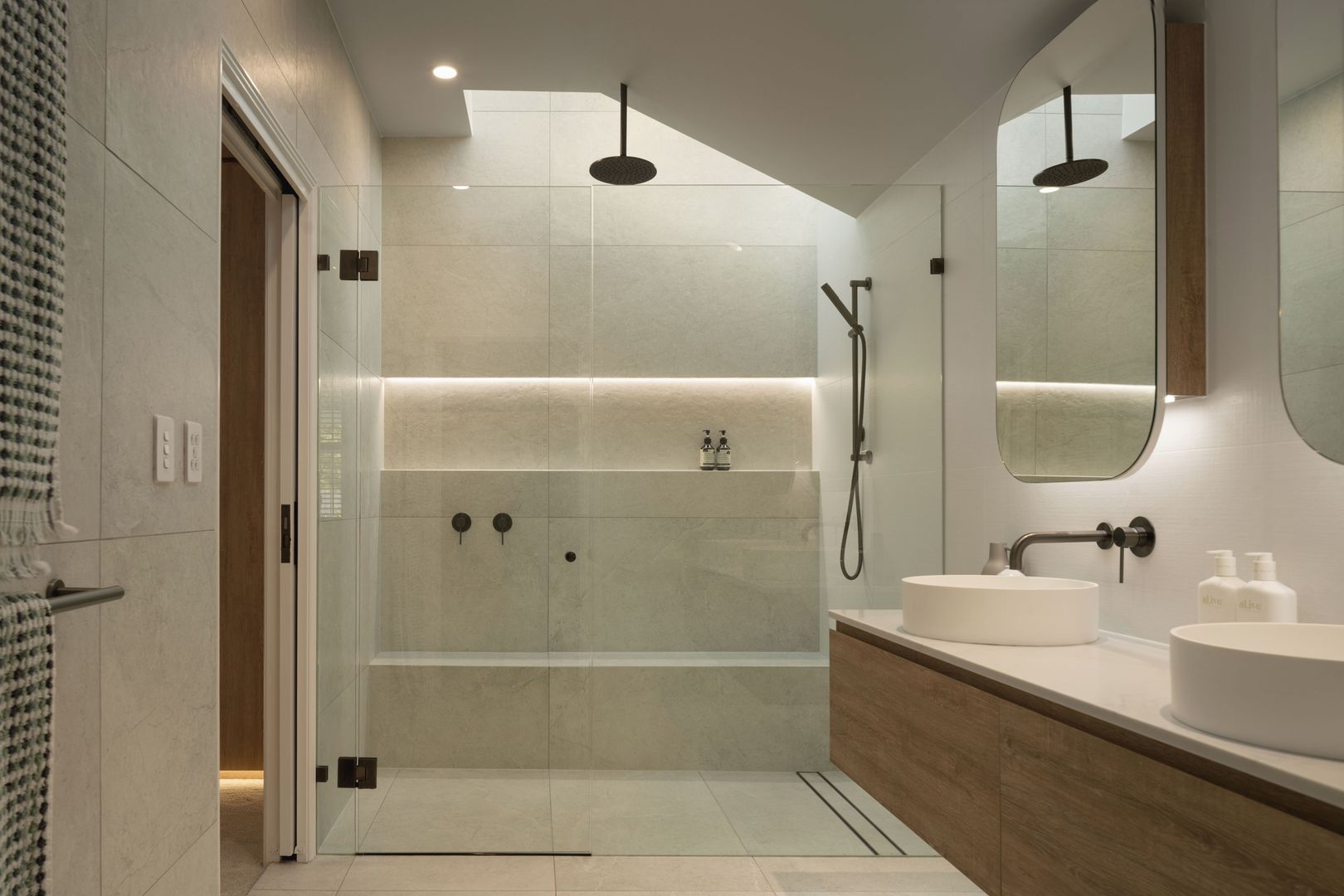 Main ensuite with double basin and rainfall shower