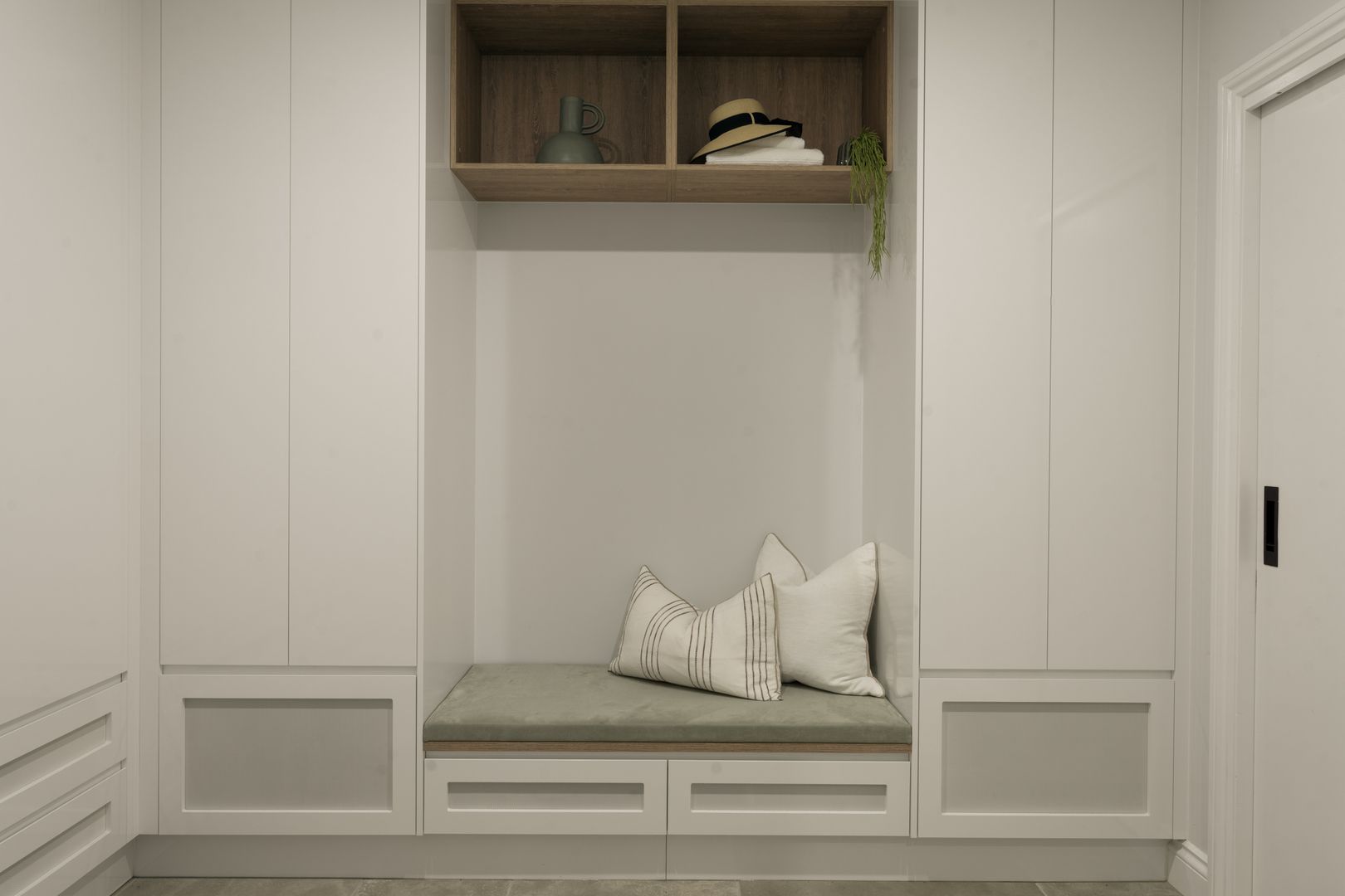 Mudroom with built in bench seat and storage 
