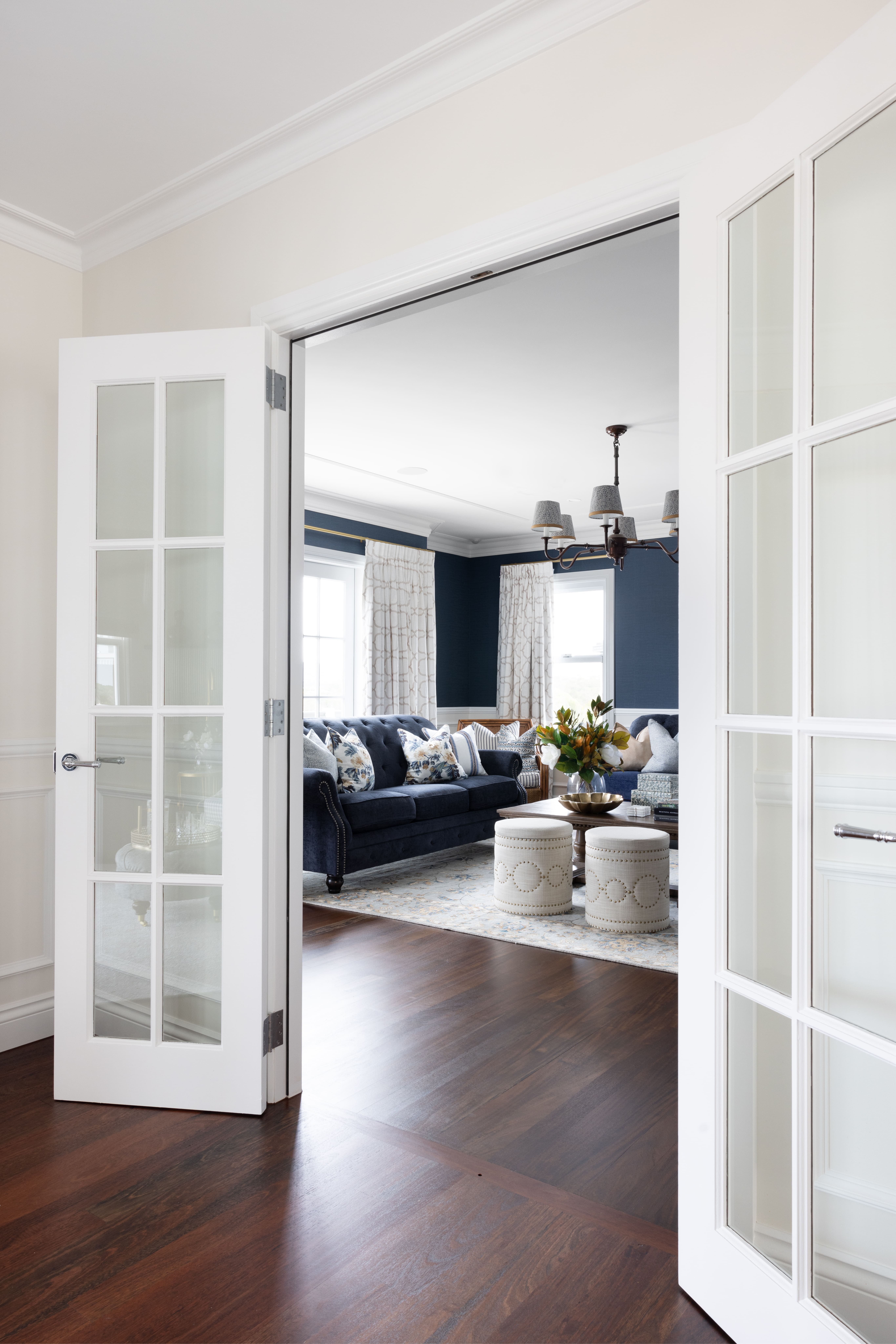 Glass panelled door opening onto living area 