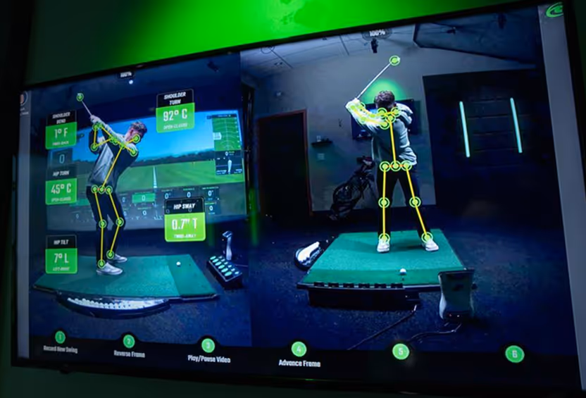 Golfer using Optimotion at the top of their swing