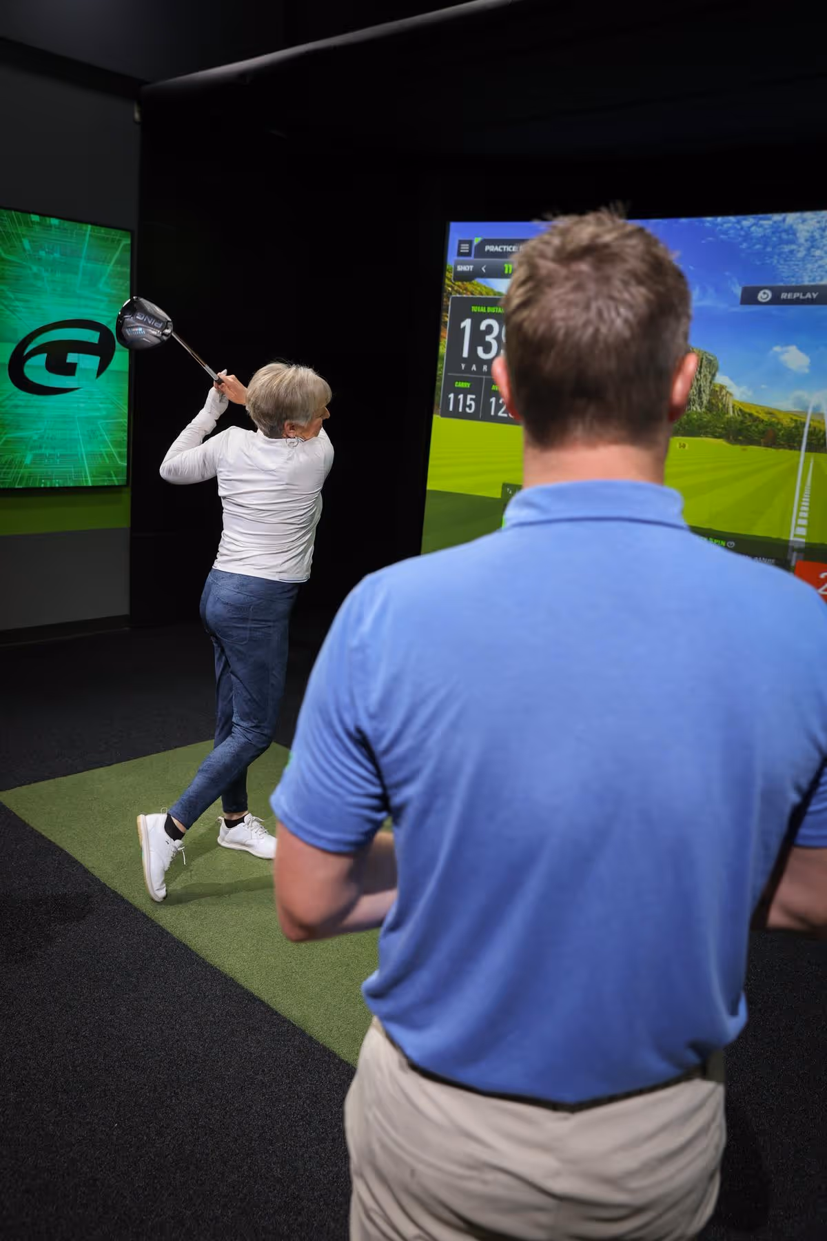 GOLFTEC coach explains a data-driven golf swing roadmap to a new student using an indoor bay and 3D motion capture technology to establish a performance baseline.