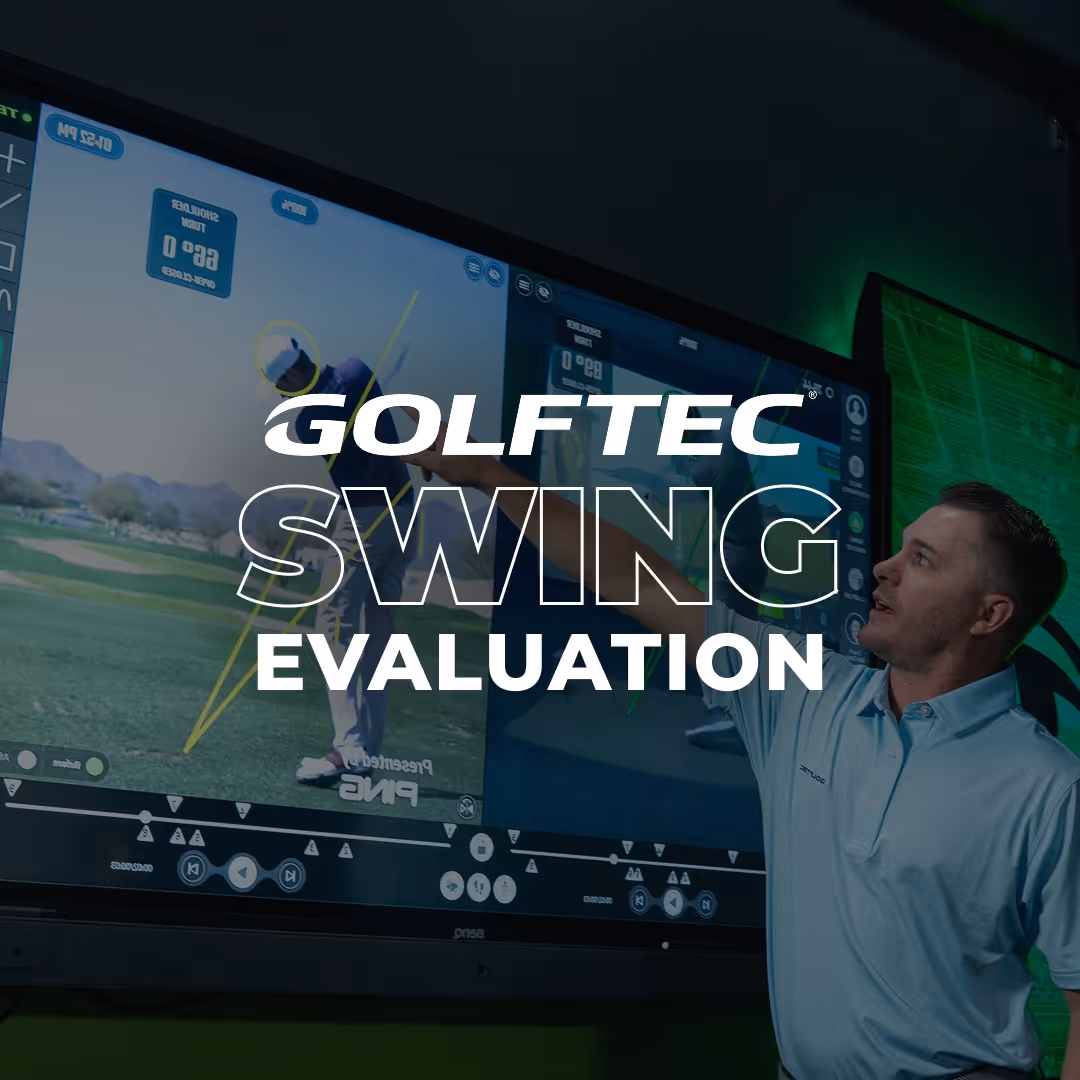 GOLFTEC Swing Evaluation: Professional golf instructor analyzing a student's golf swing using motion measurement technology on a high-definition simulator.