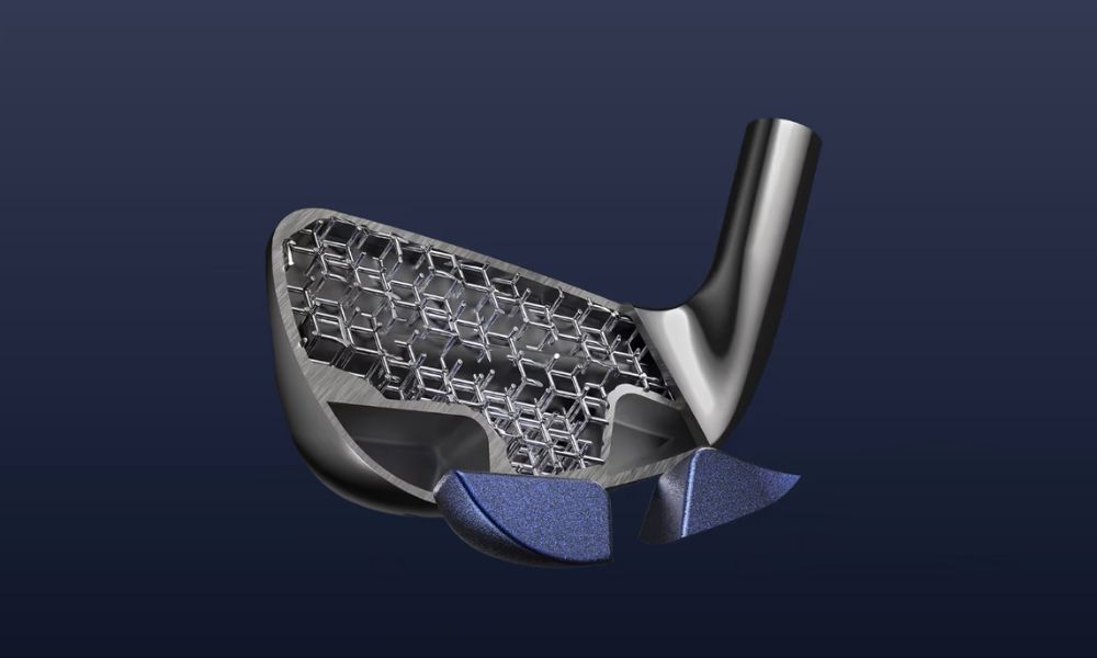 Exploded view of a Cobra 3DP iron revealing 3D-printed lattice design against a navy background