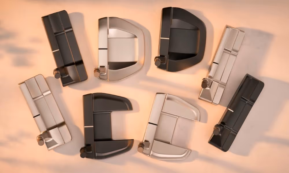 Multiple Mizuno M-Craft putter head shapes displayed from above on a warm-toned background