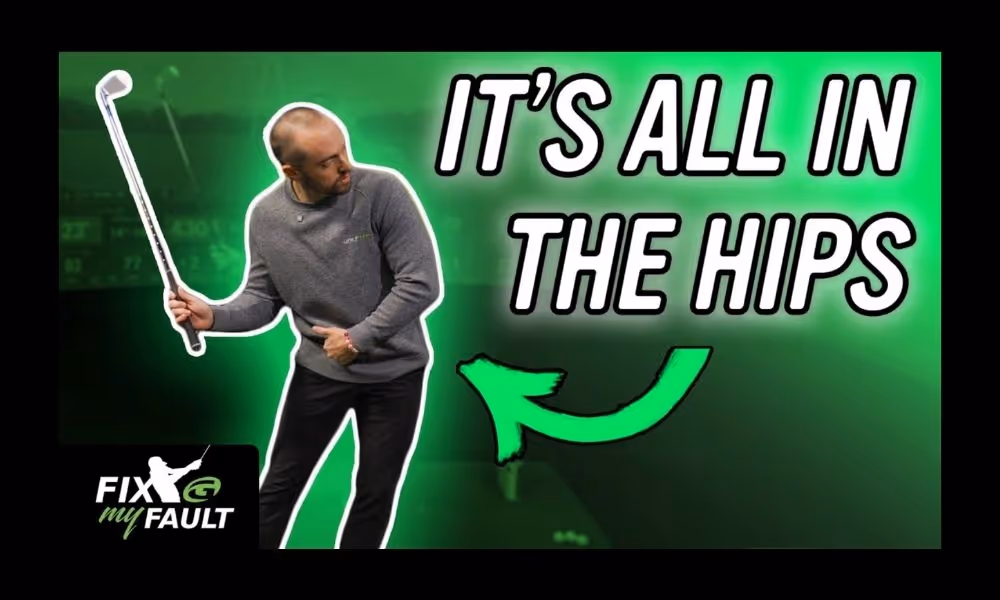 instructor moving hips back in golf swing against green background