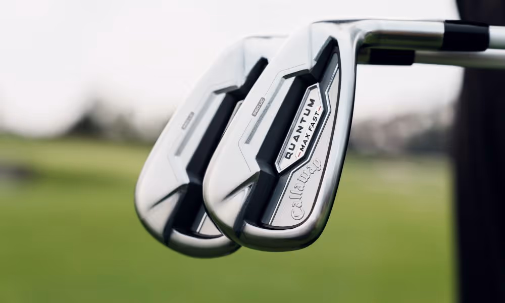 close up view of the quantum max fast iron clubhead view with faded course background