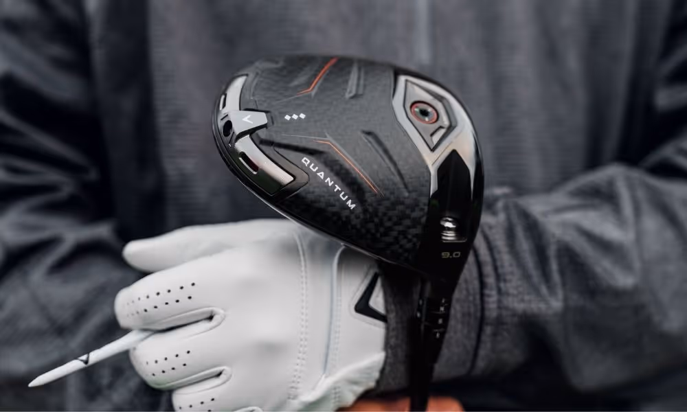 Golfer holding Quatum triple diamond driver in their arm
