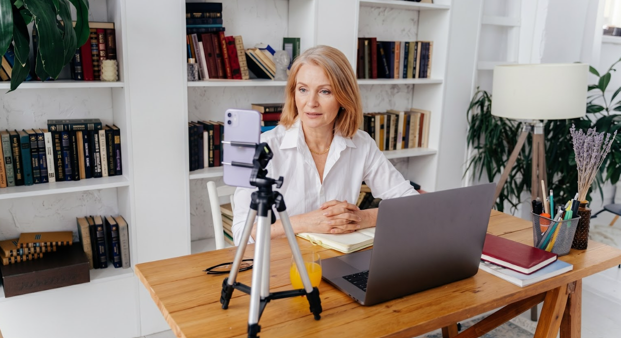 Author filming a short form video for social media