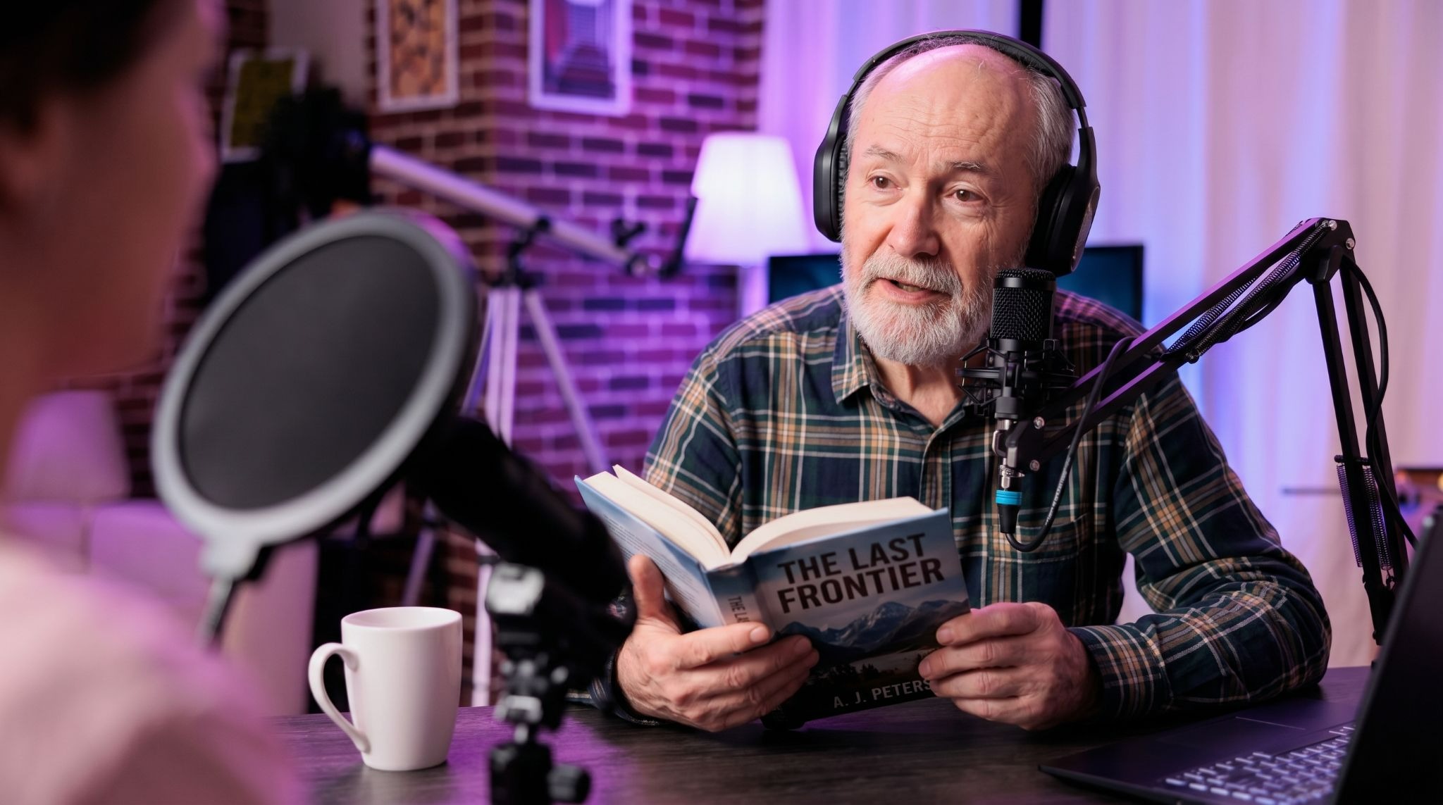 An author promoting his book on a podcast show