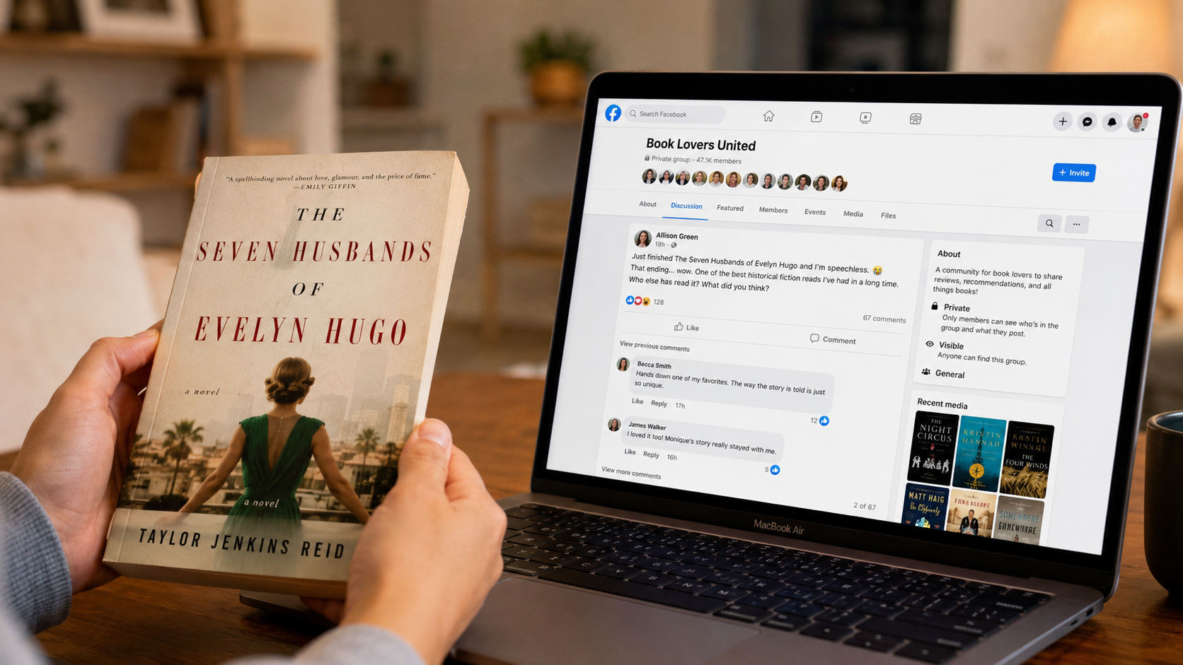 A close up of hands holding a paperback book next to a laptop showing a Facebook group discussion