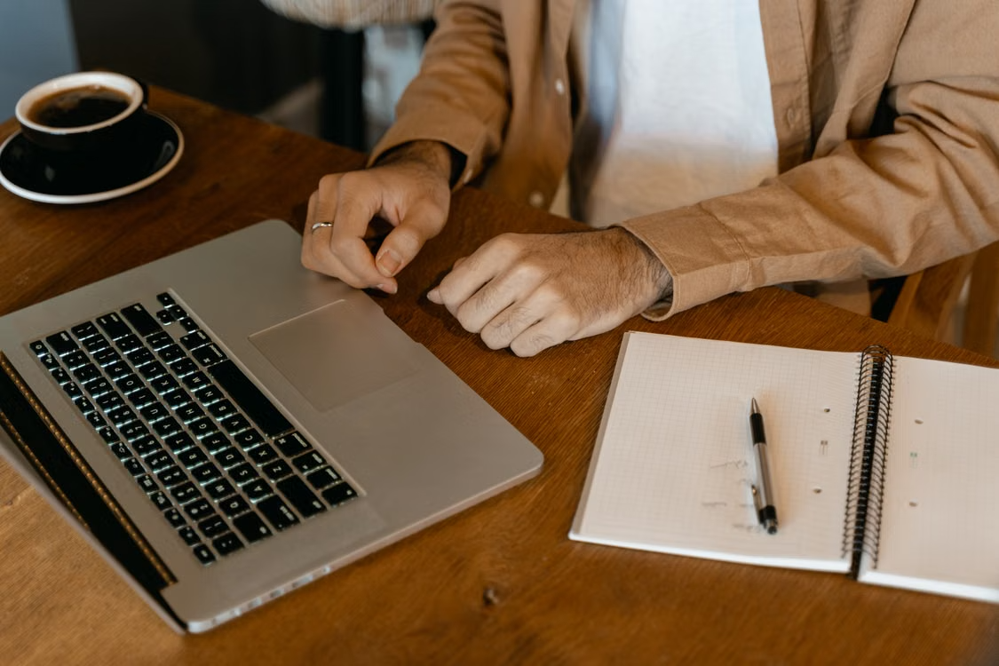 Author planning a book launch marketing strategy at a desk