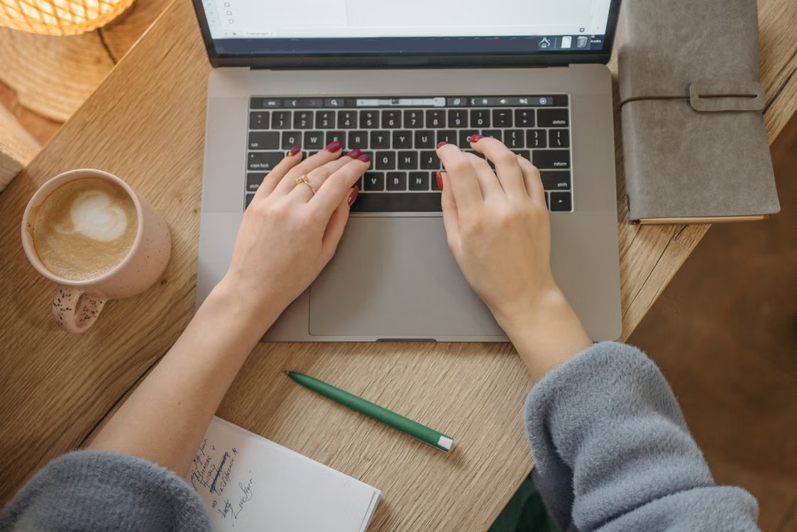 Author planning a book launch marketing strategy at a desk